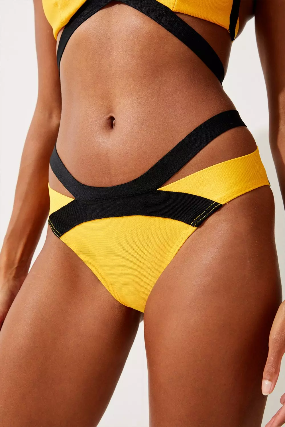 Yellow bikini store top black bottoms