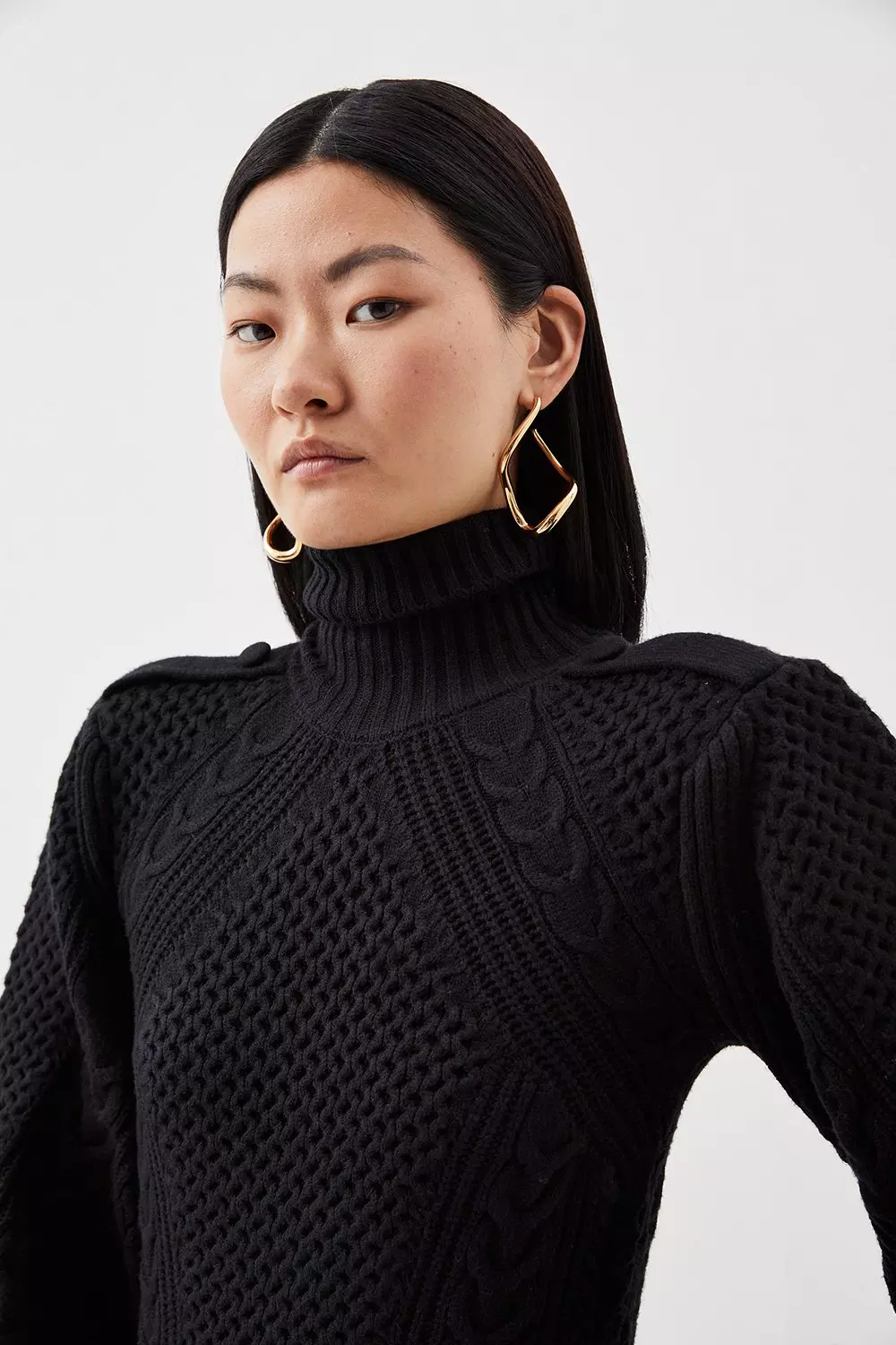 Black cable store knit roll neck