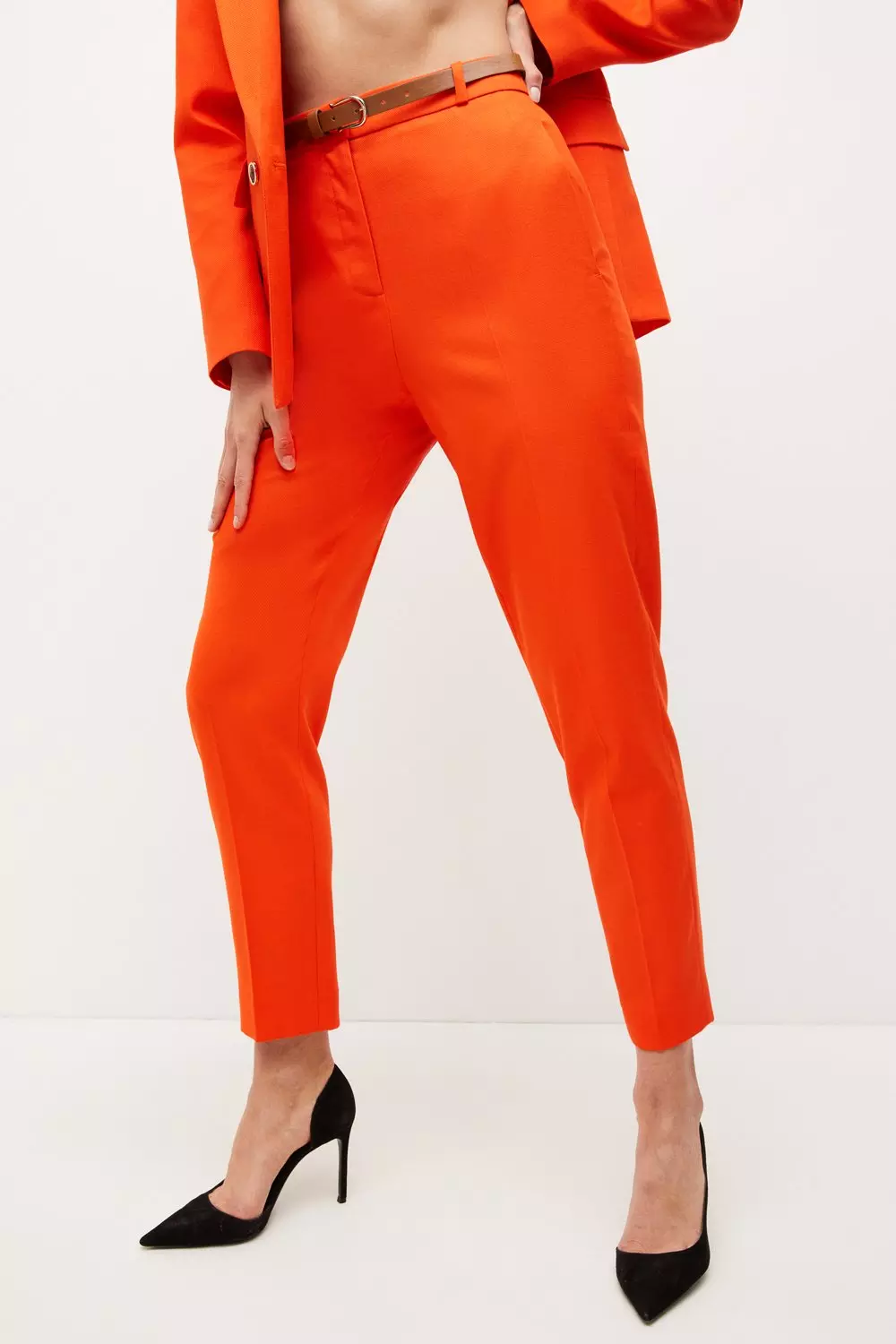 Orange store belted trousers