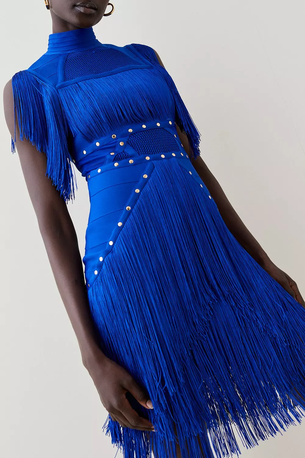 Fringed recycled-bandage gown