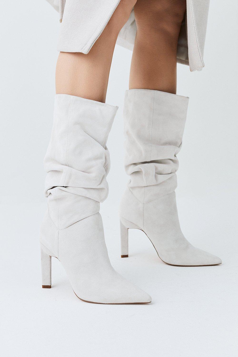 Mid heel outlet boot