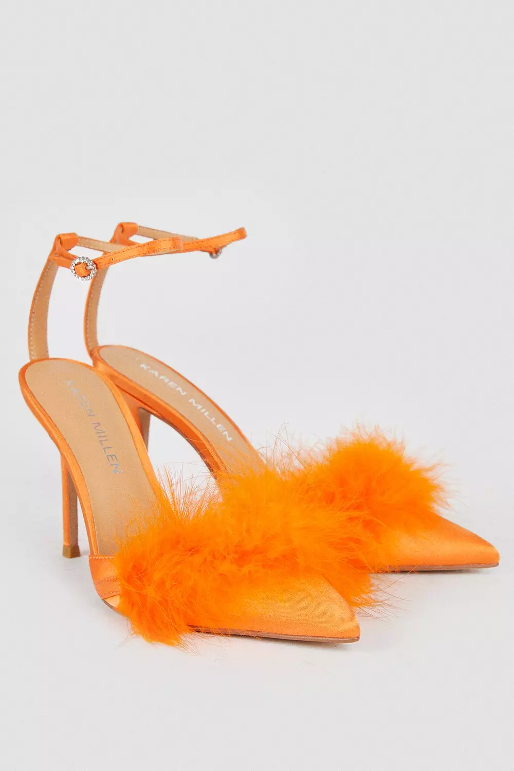 Heels with store feathers on back