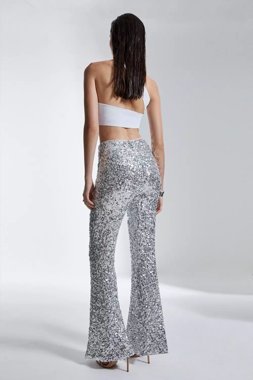 GET DOWN ON IT SEQUIN FLARE TROUSER IN PINK