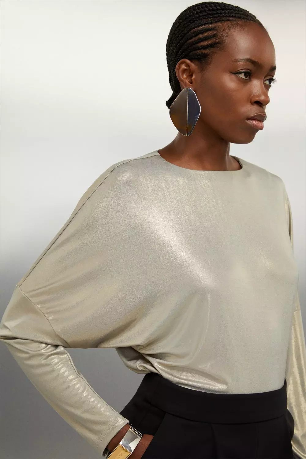 Gold store batwing top