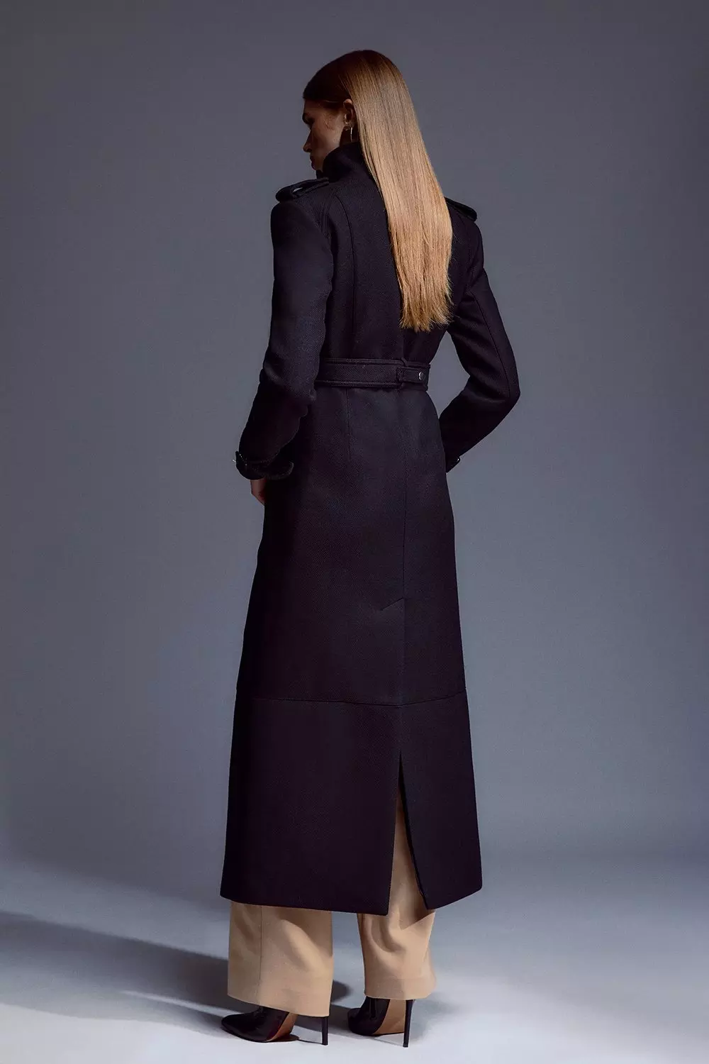 Long black tailored store coat