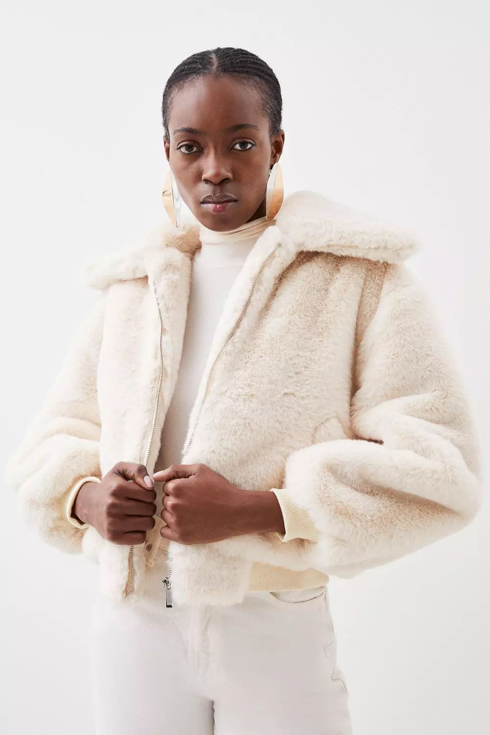 Faux fur bomber store with hood