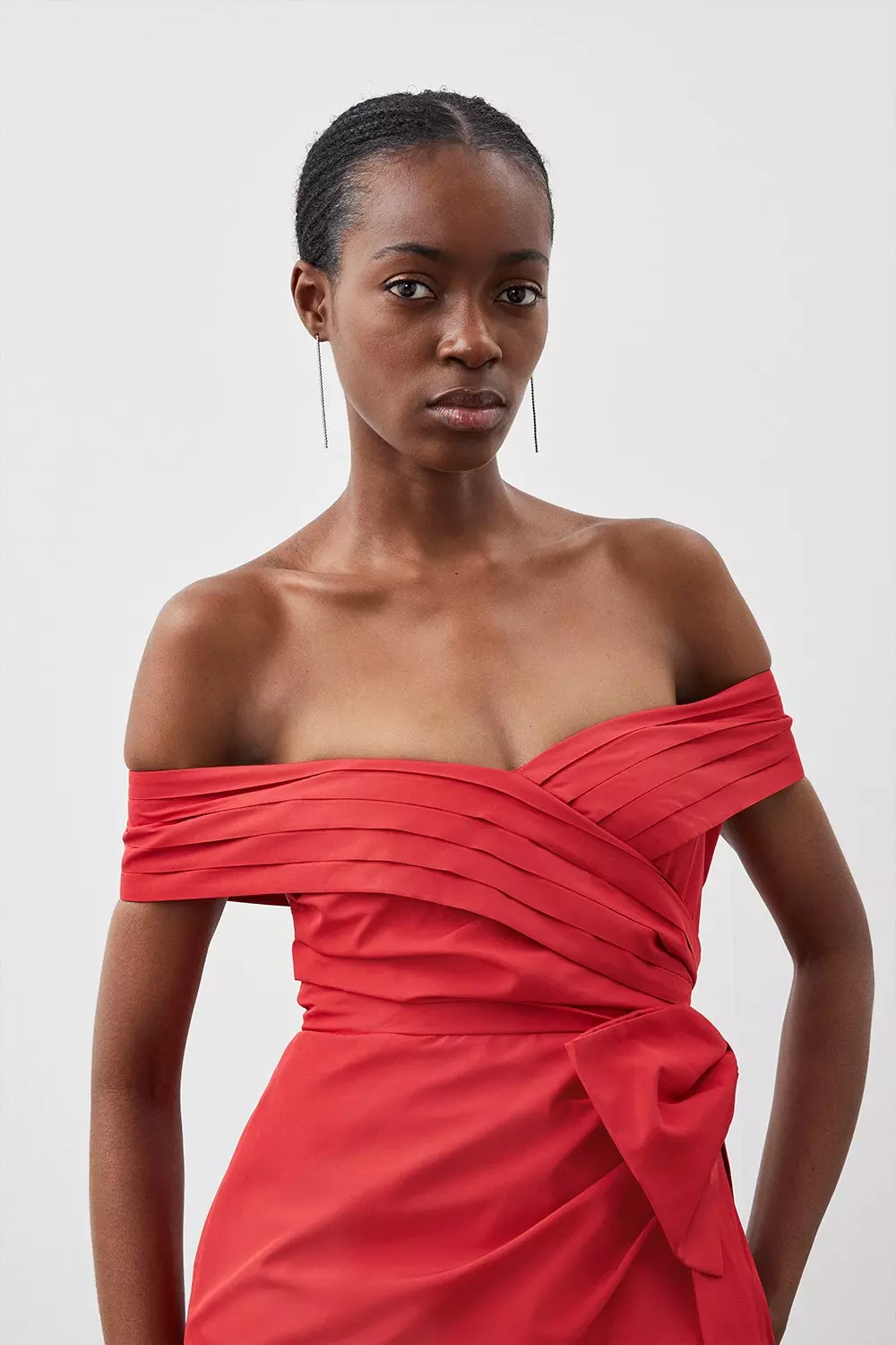 Red dress with store bow on shoulder