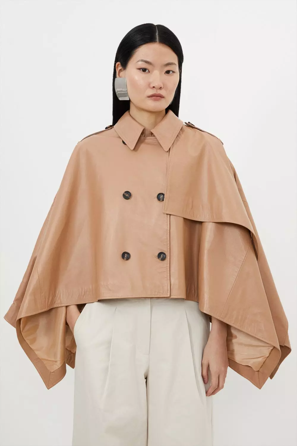 Jacket with outlet cape sleeves