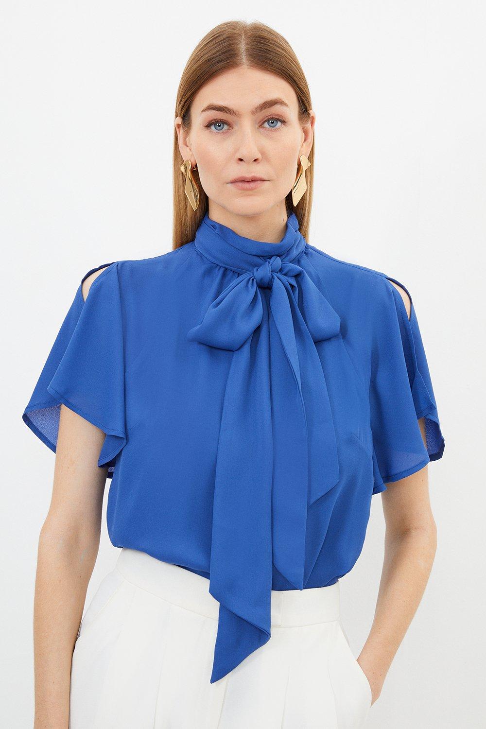 Tie neck ruffle store blouse