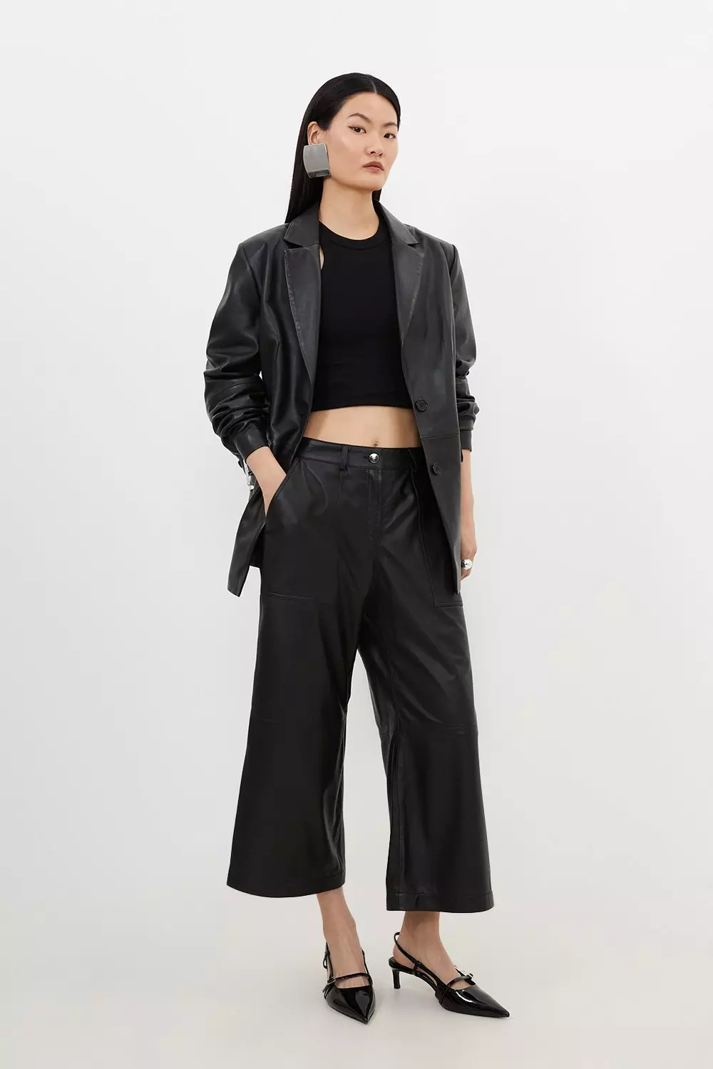 Black lace top + culotte pants date night outfit by extra petite