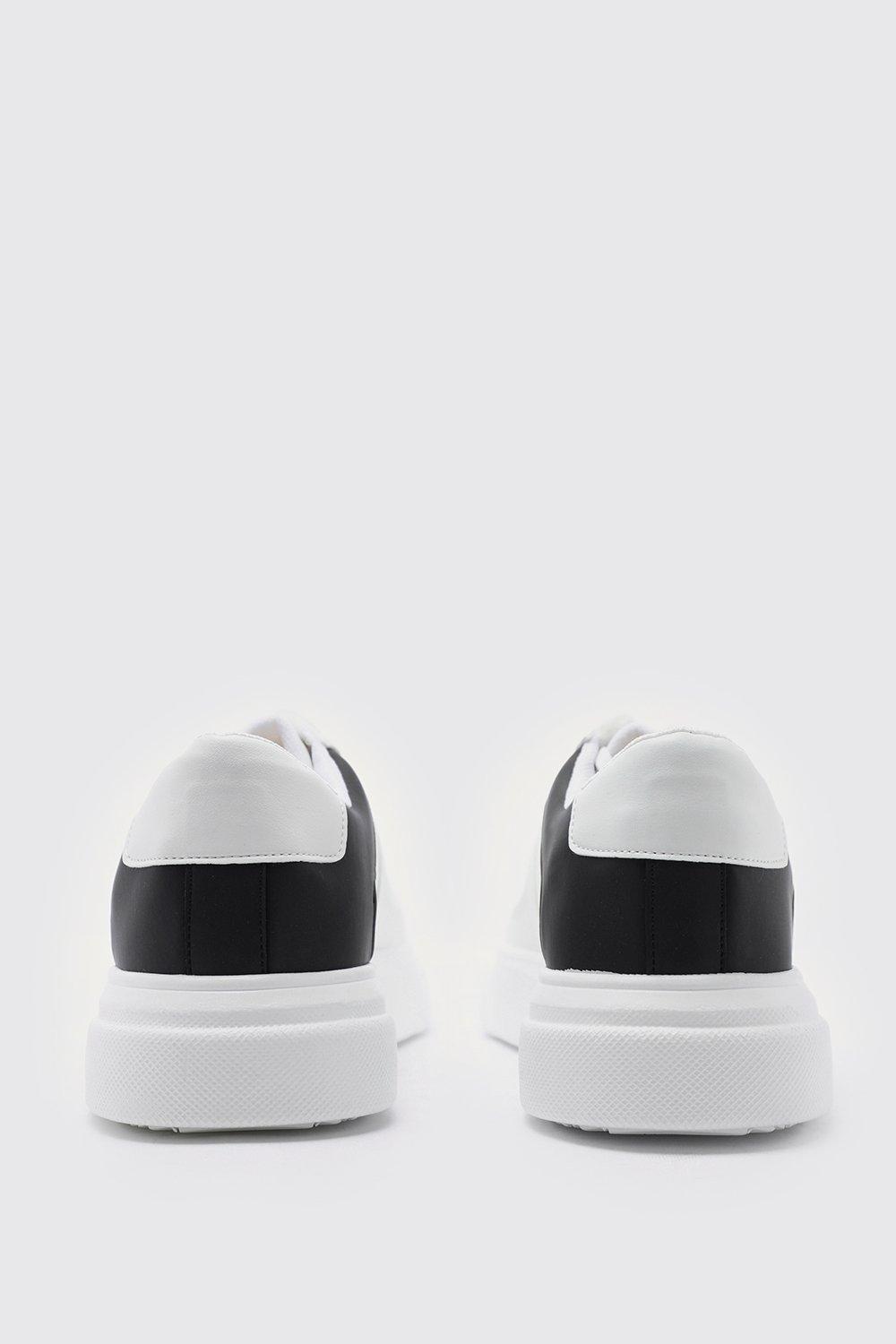 white trainers with black back
