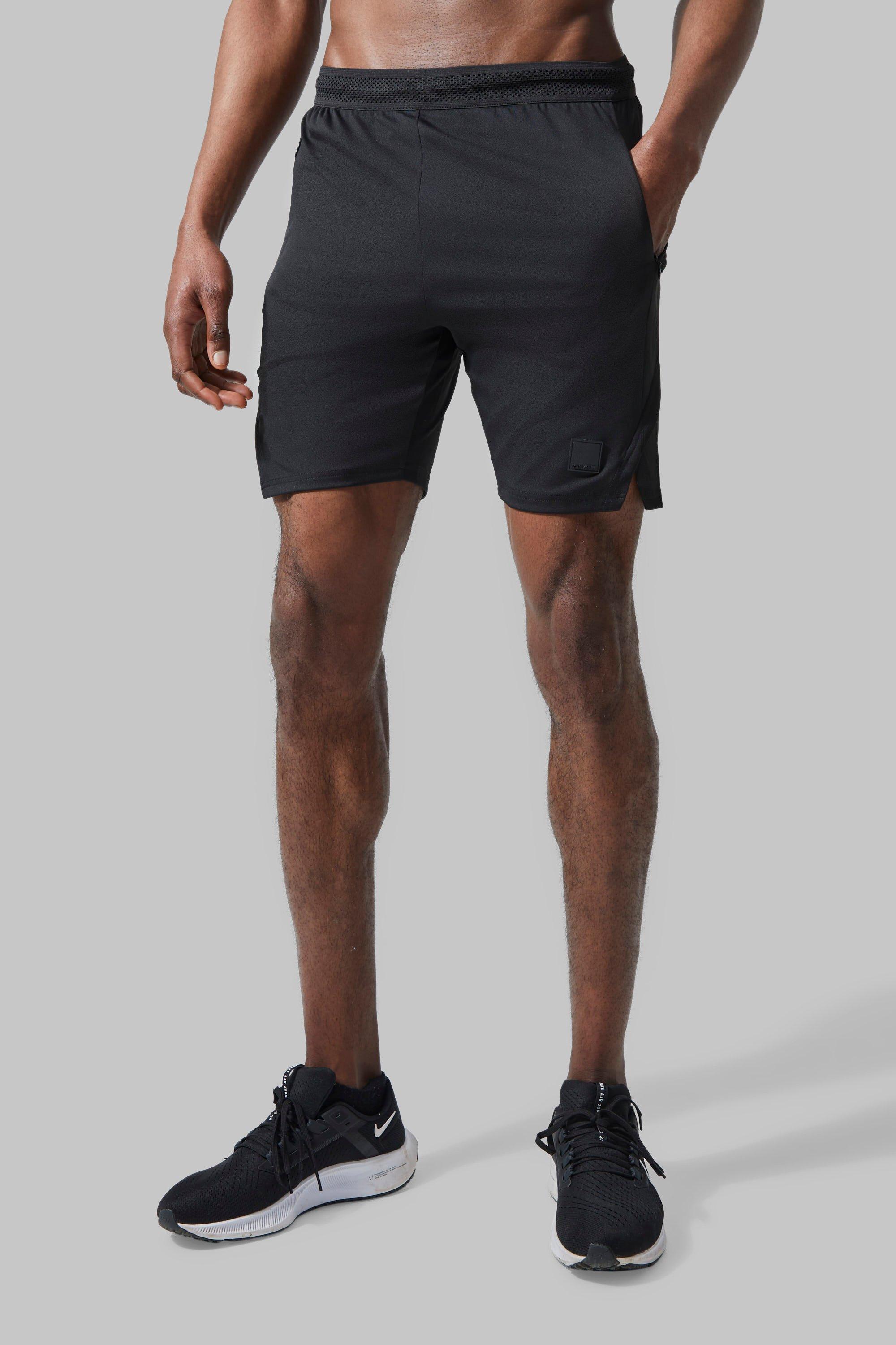 Mens Black Man Active Performance Regular Fit 7inch Split Hem Shorts, Black