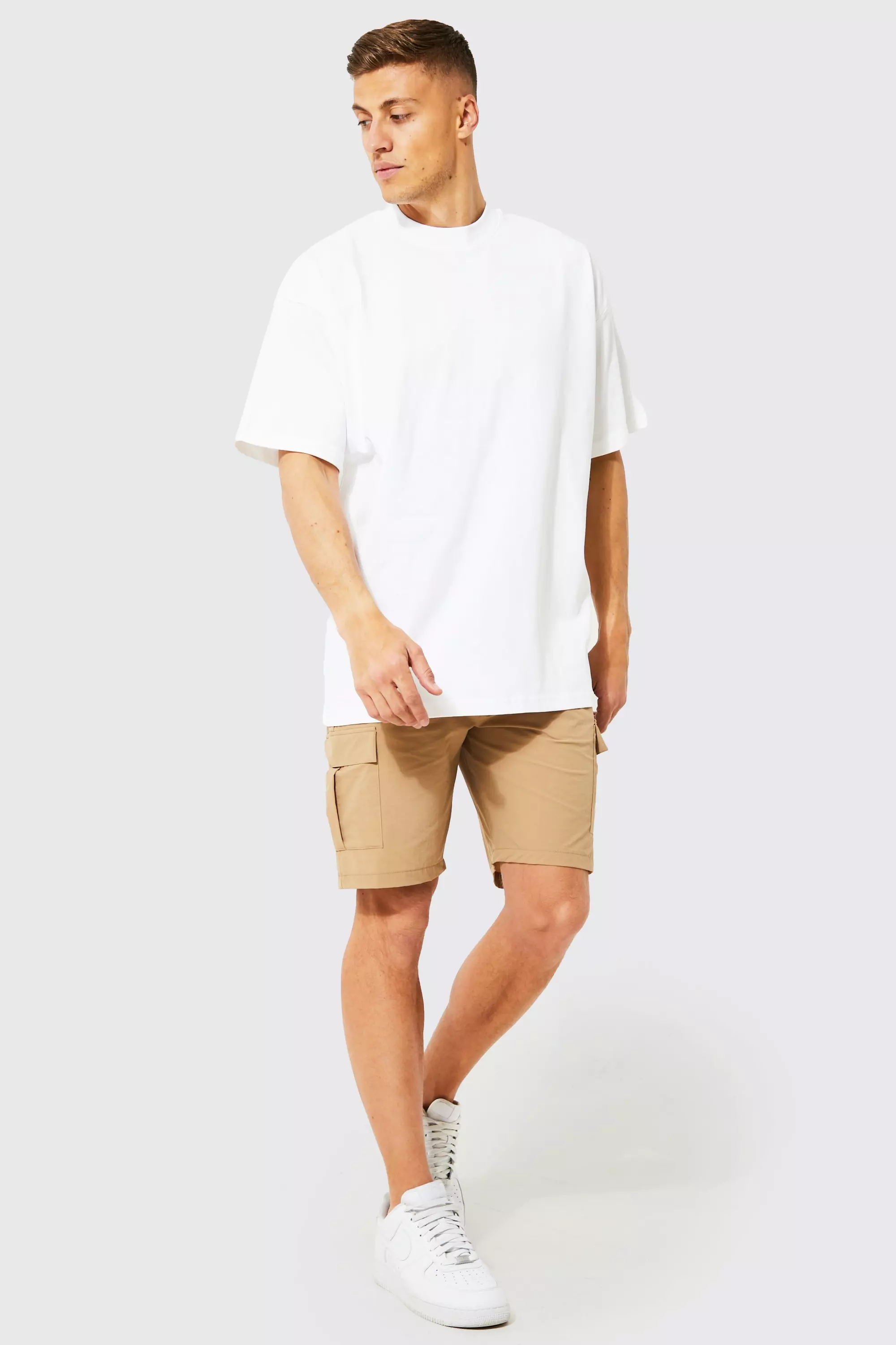 Khaki shorts store and white shirt