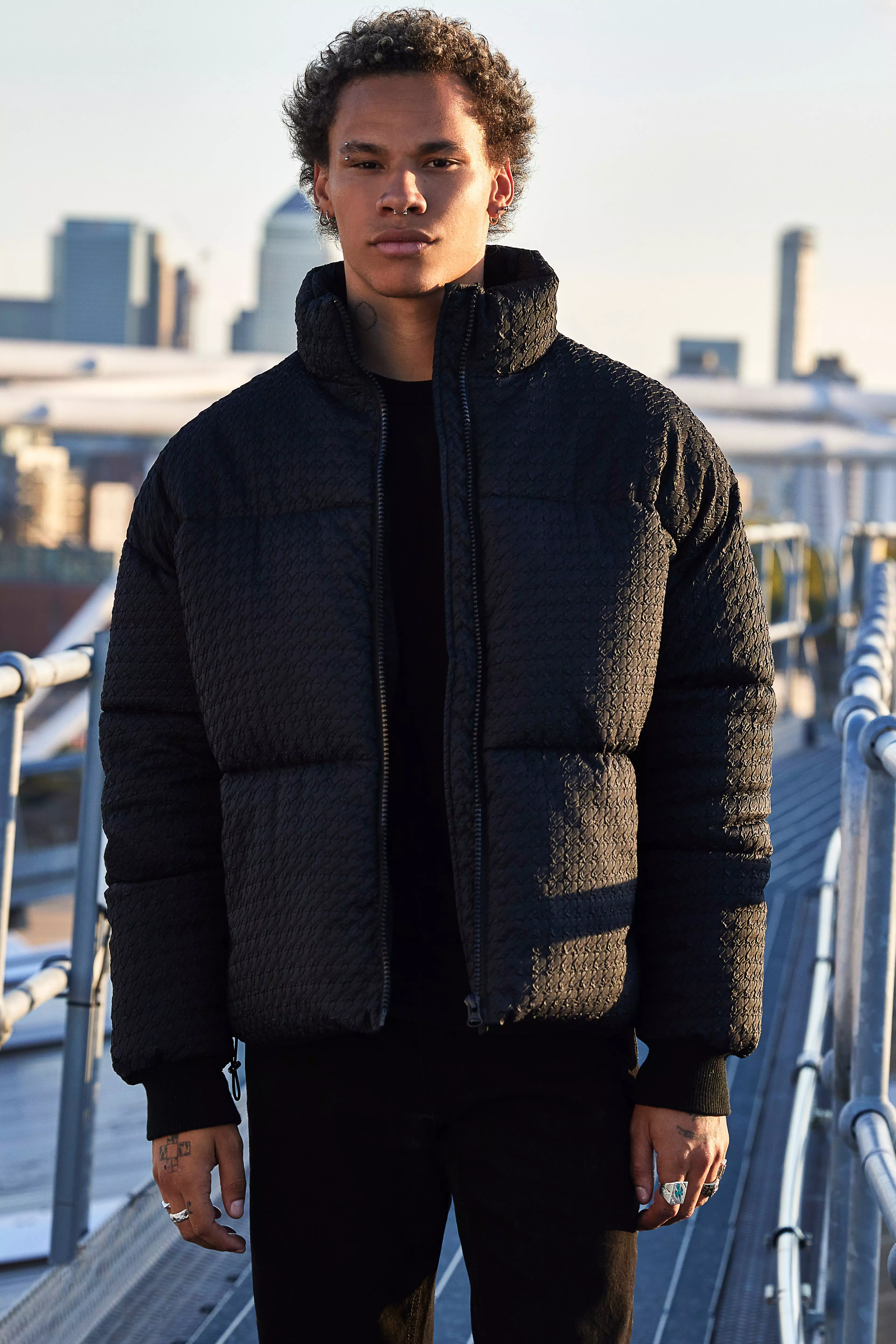 Black funnel shop neck puffer jacket