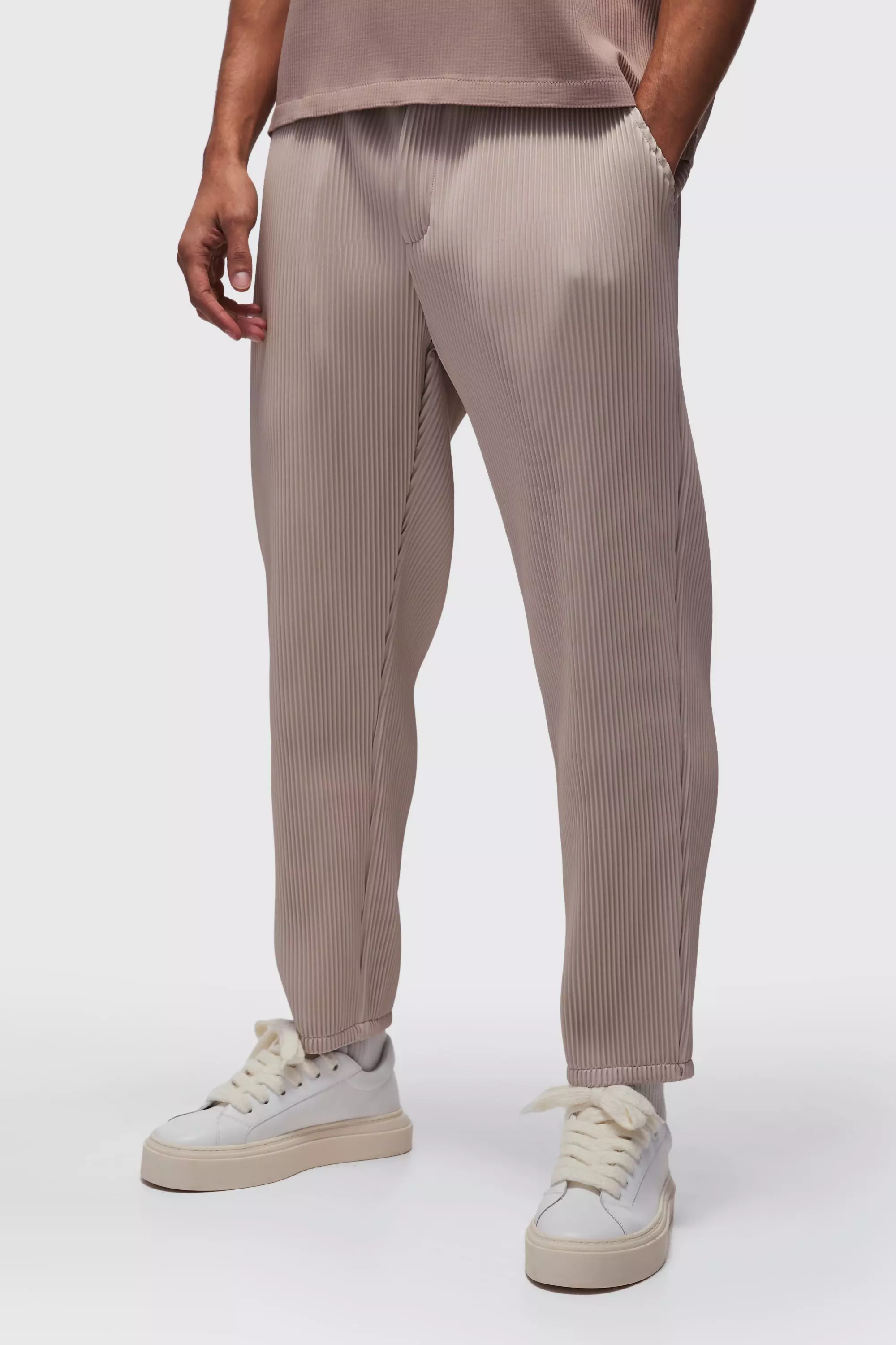 Grey Tapered technical-pleated trousers