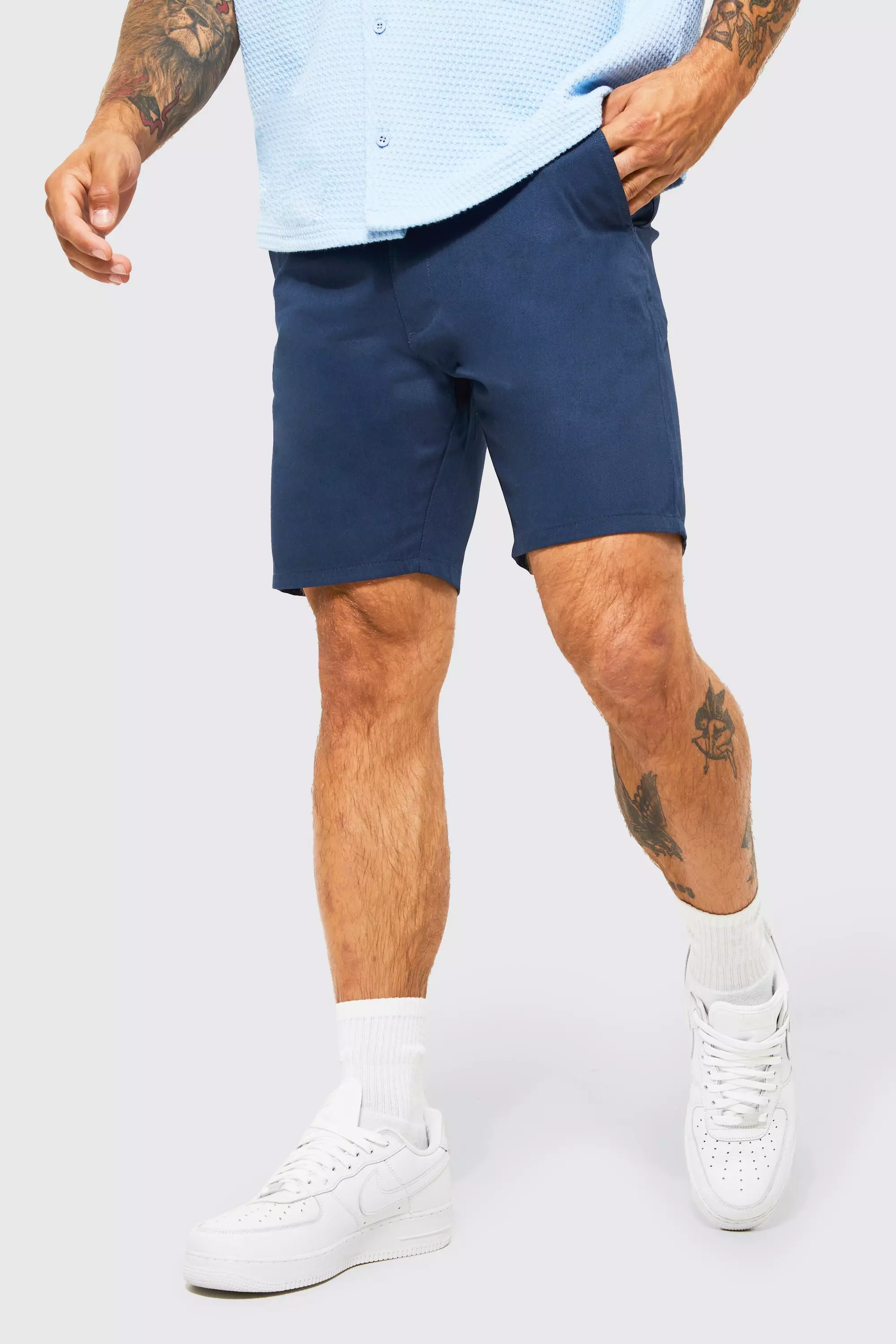 ASOS DESIGN slim chino shorts in navy