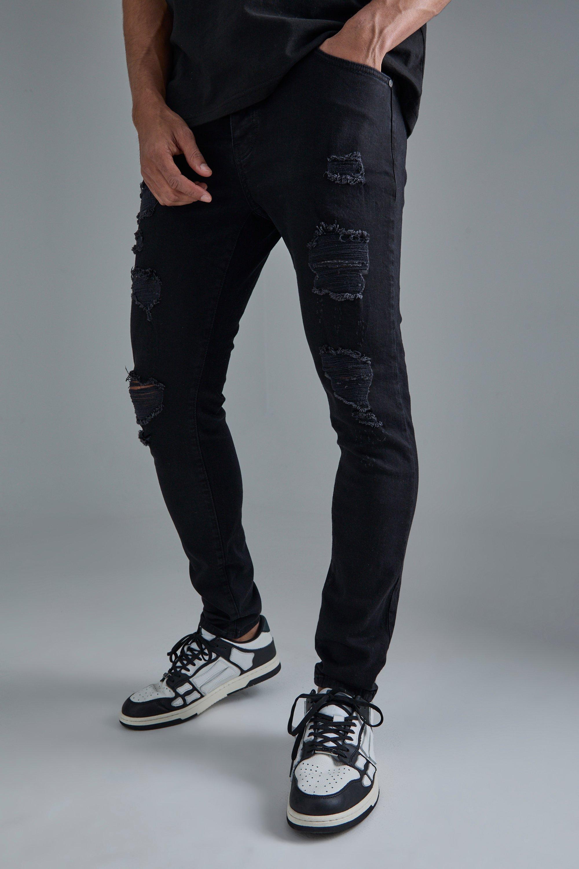 Image of Jeans Skinny Fit Stretch con strappi all over, Nero