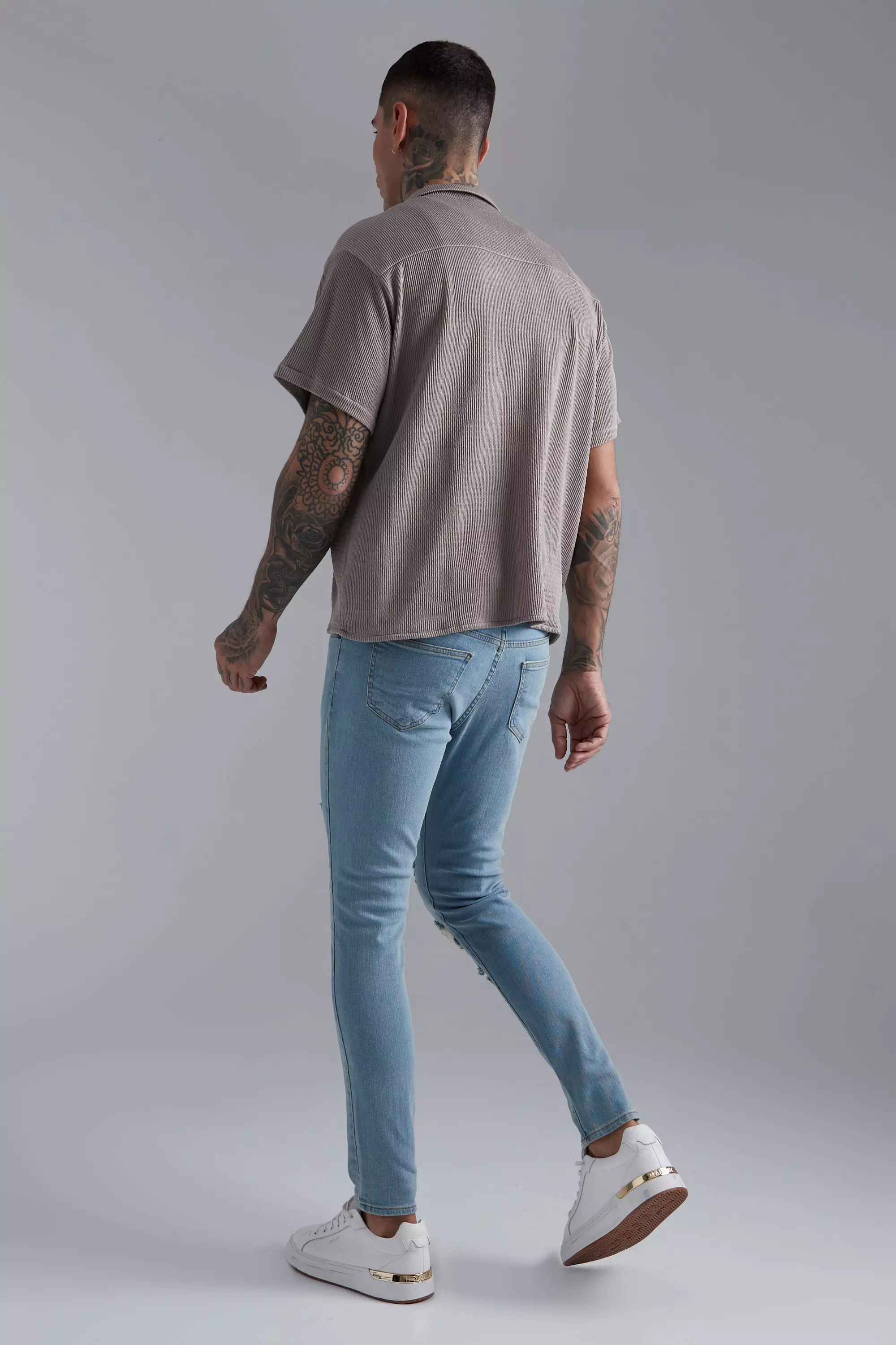 Skinny Stretch All Over Rip Jeans