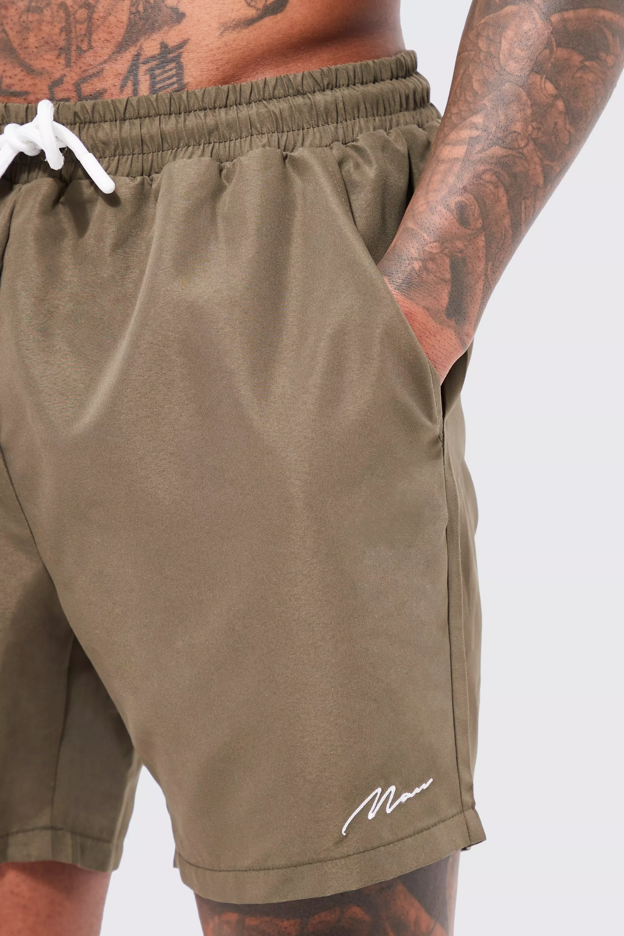 Man Signature Mid Length Swim Shorts