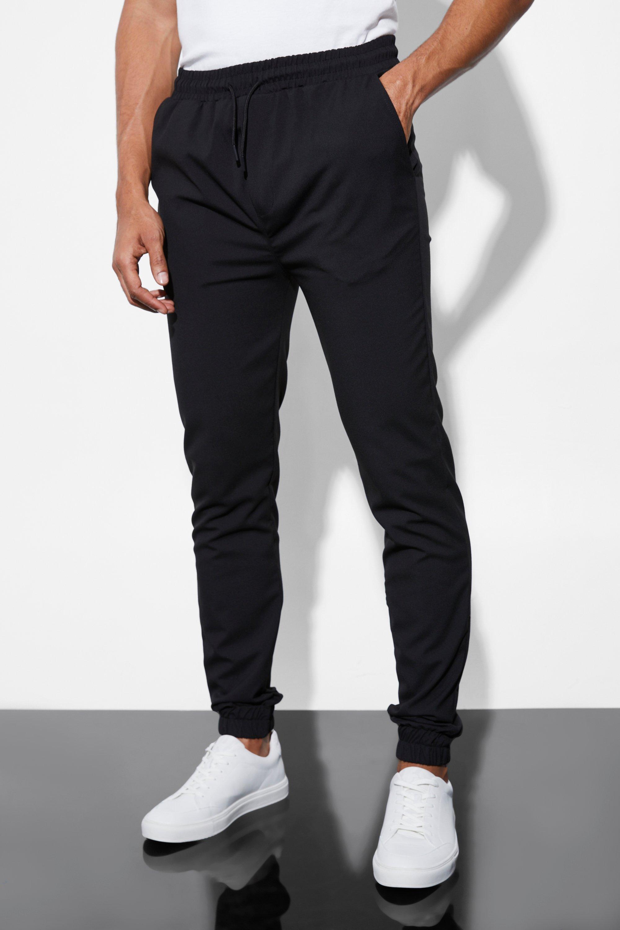 Image of Pantaloni Slim Fit elasticizzati con polsini alle caviglie, Nero