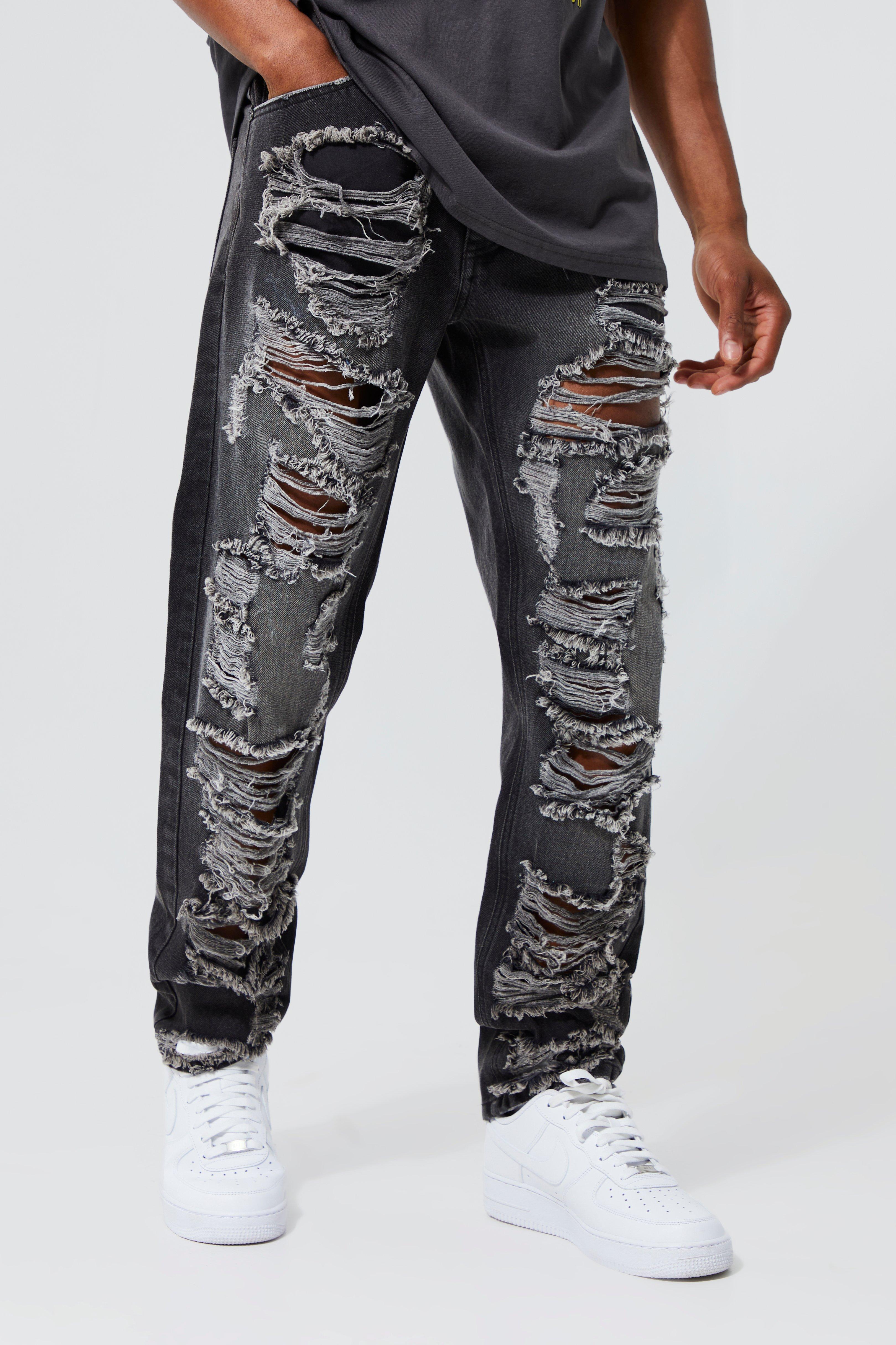 Image of Jeans dritti in denim rigido con strappi estremi e inserti, Nero