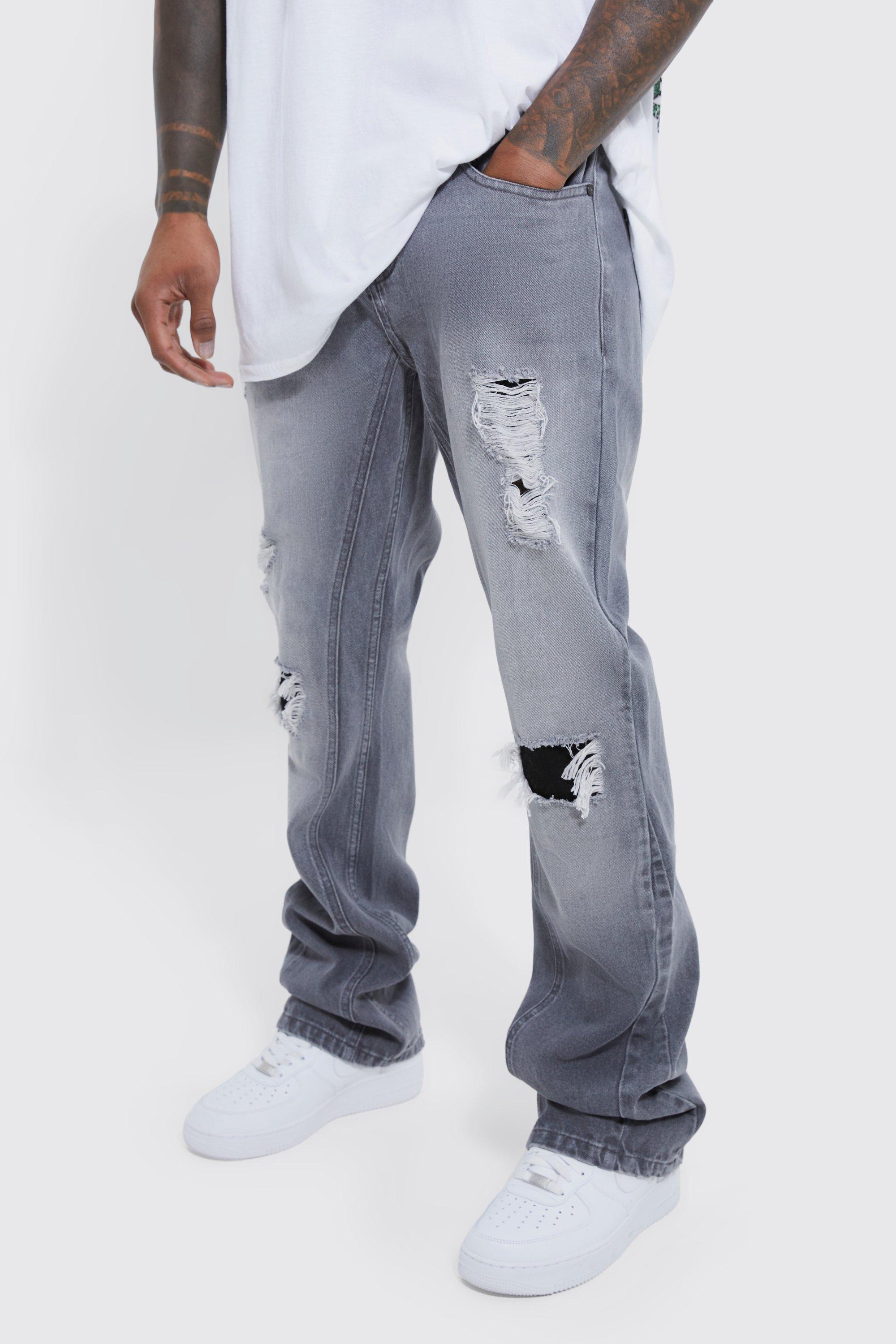 Image of Jeans a zampa Slim Fit con strappi & rattoppi, Grigio