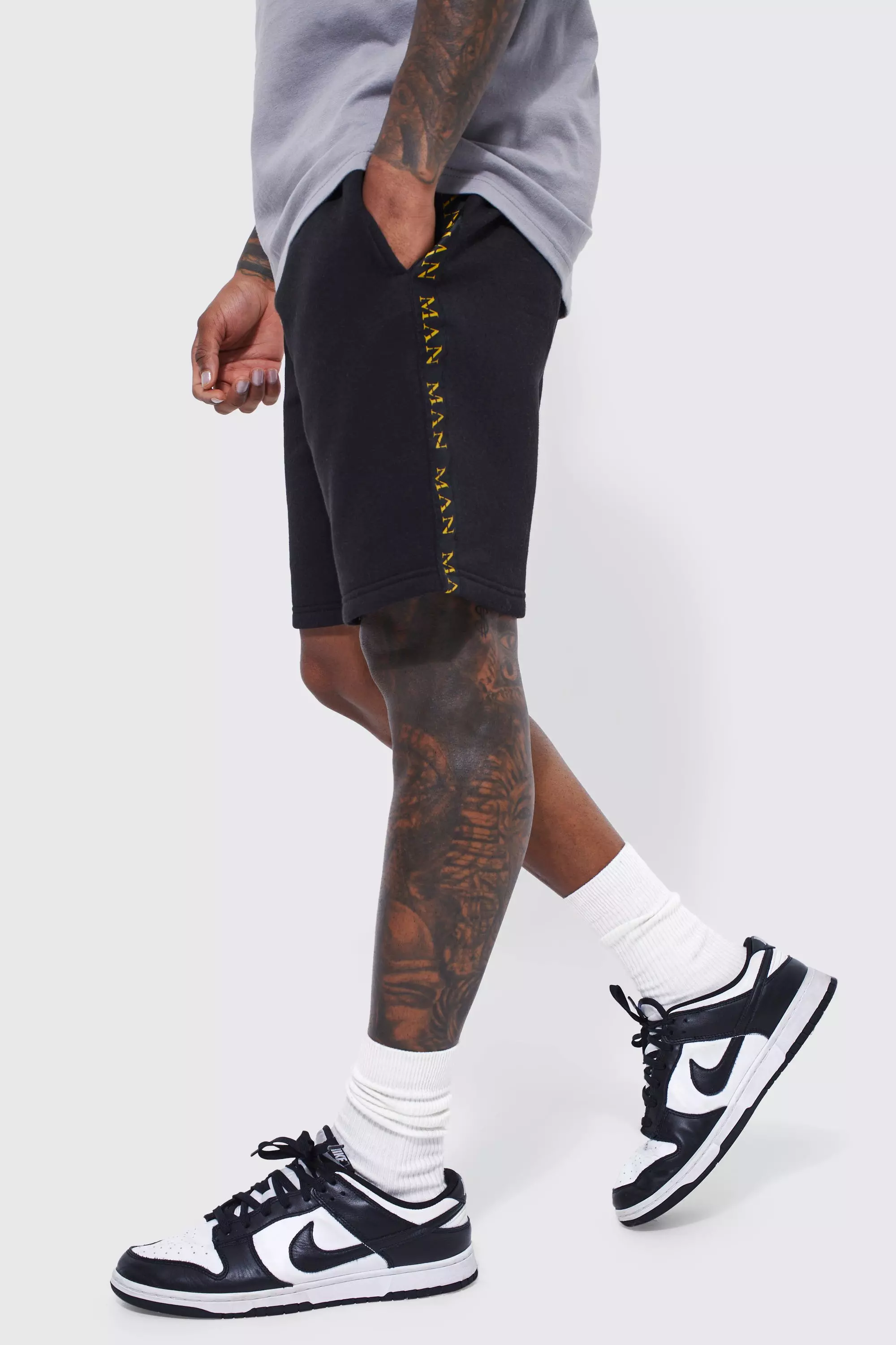 Black and hotsell gold jordan shorts