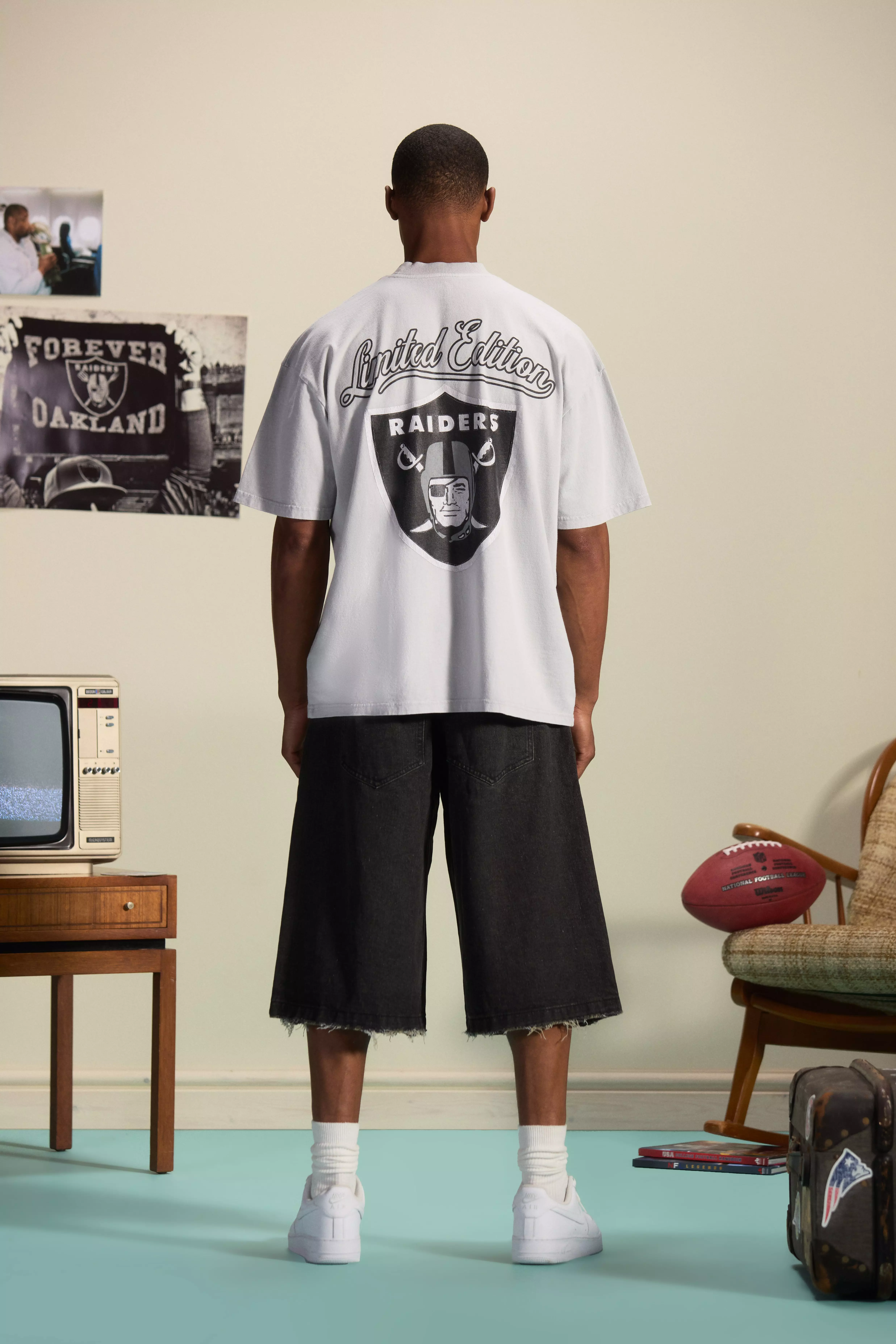 ASOS DESIGN NFL oversized sleeveless t-shirt with Raiders front print