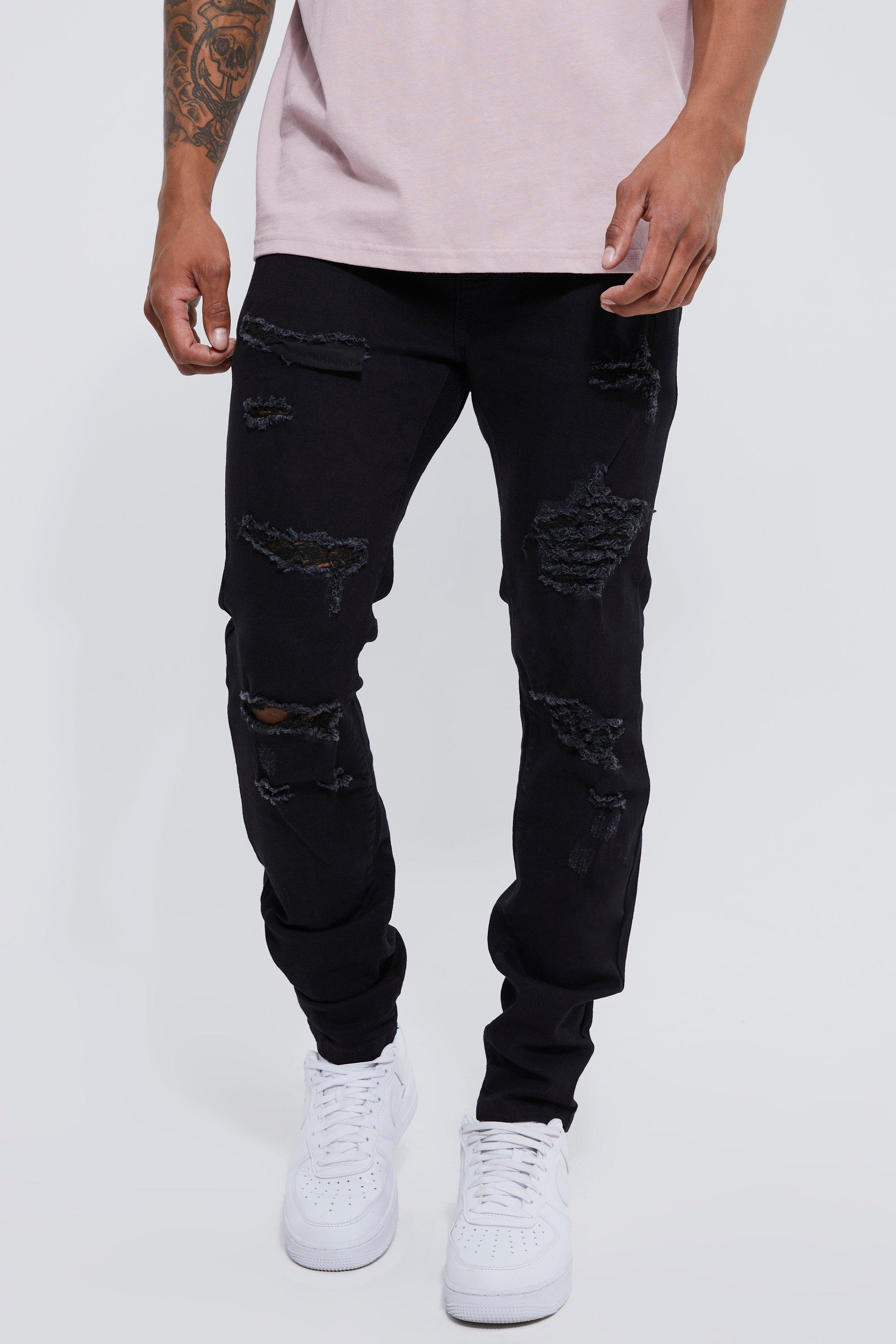 Image of Jeans Skinny Fit Stretch con strappi all over, Nero