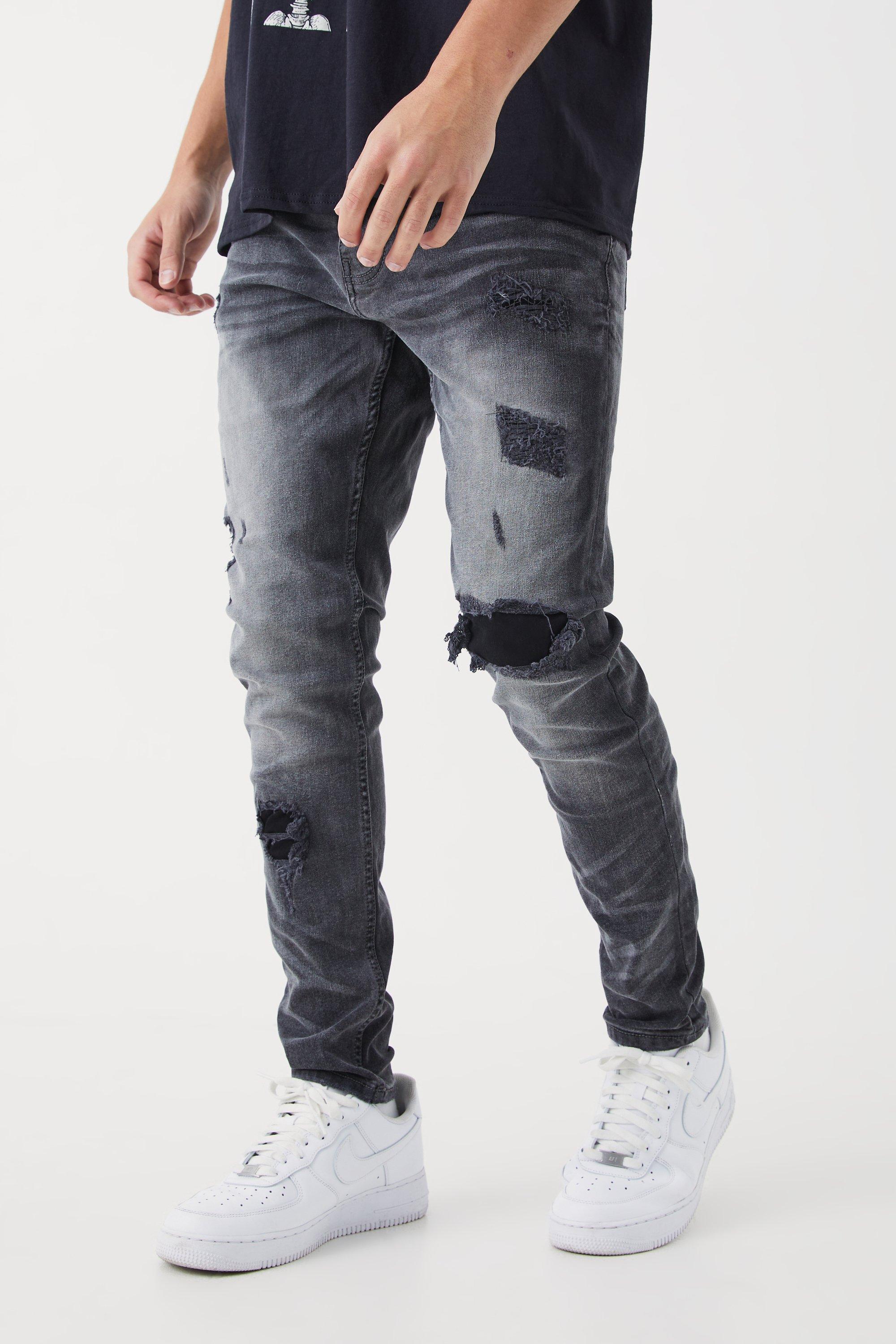 Image of Jeans Skinny Fit Stretch con strappi & rattoppi in tessuto, Grigio