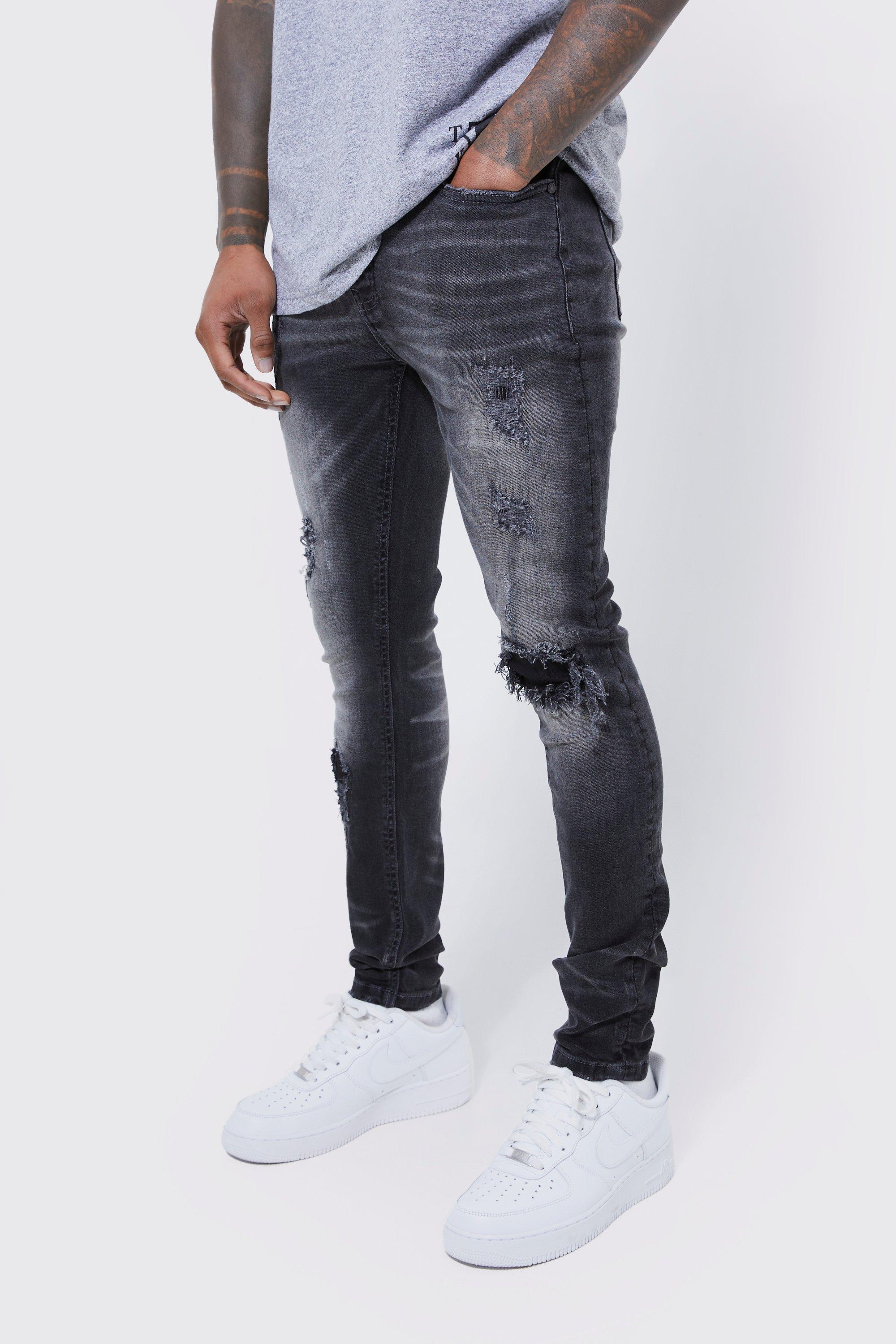 Image of Jeans Skinny Fit Stretch con strappi & rattoppi in tessuto, Grigio