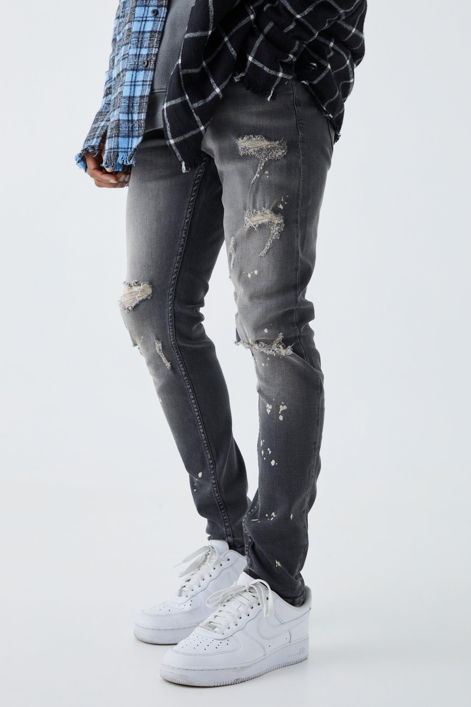Image of Jeans Skinny Fit Stretch candeggiati con strappi sul ginocchio, Grigio