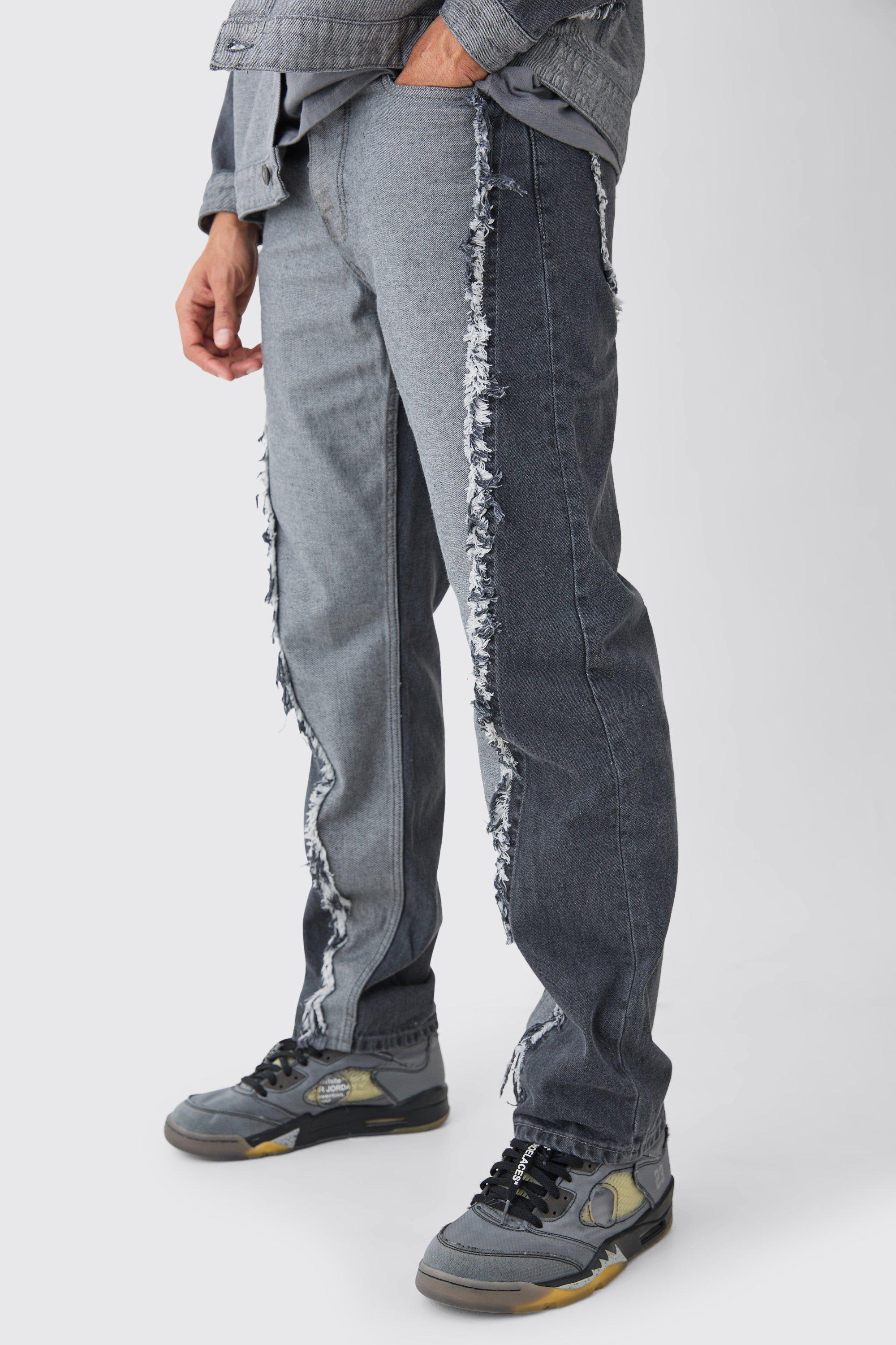 Image of Jeans rilassati in denim rigido effetto patchwork con fondo sfilacciato, Grigio