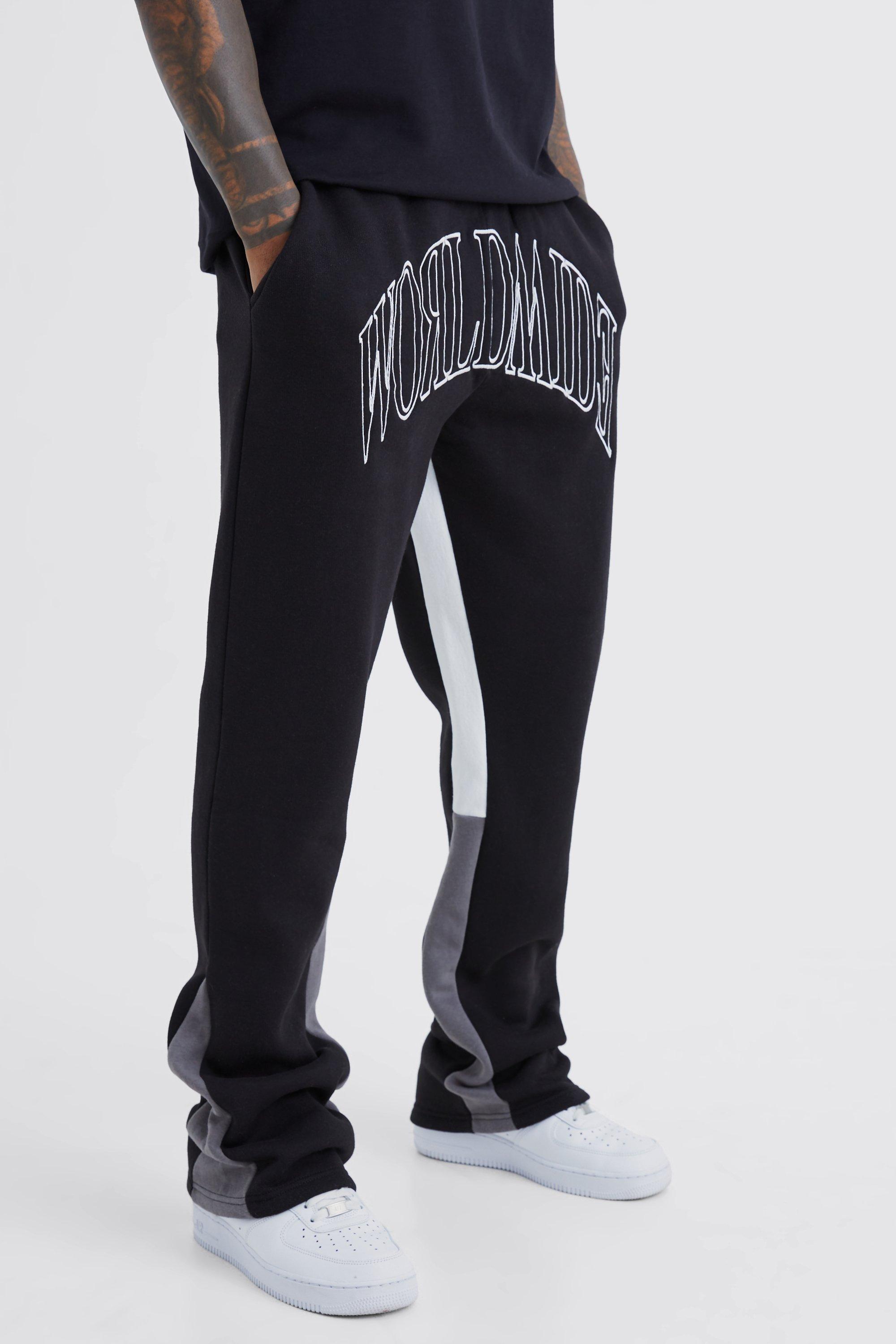 Image of Pantaloni tuta Worldwide con cuciture a contrasto e inserti, Nero