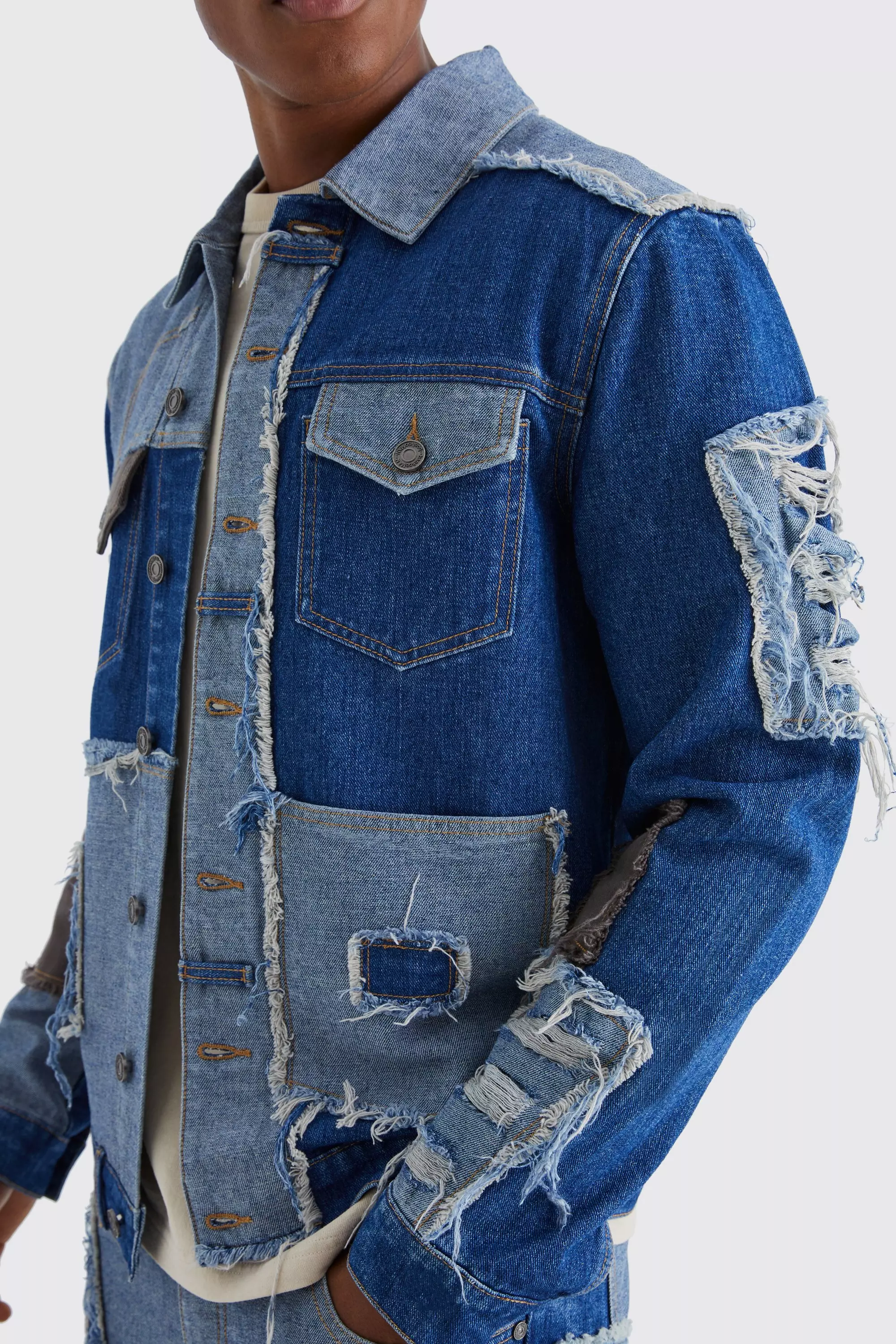 Patchwork Denim Jacket in Blue - Amiri