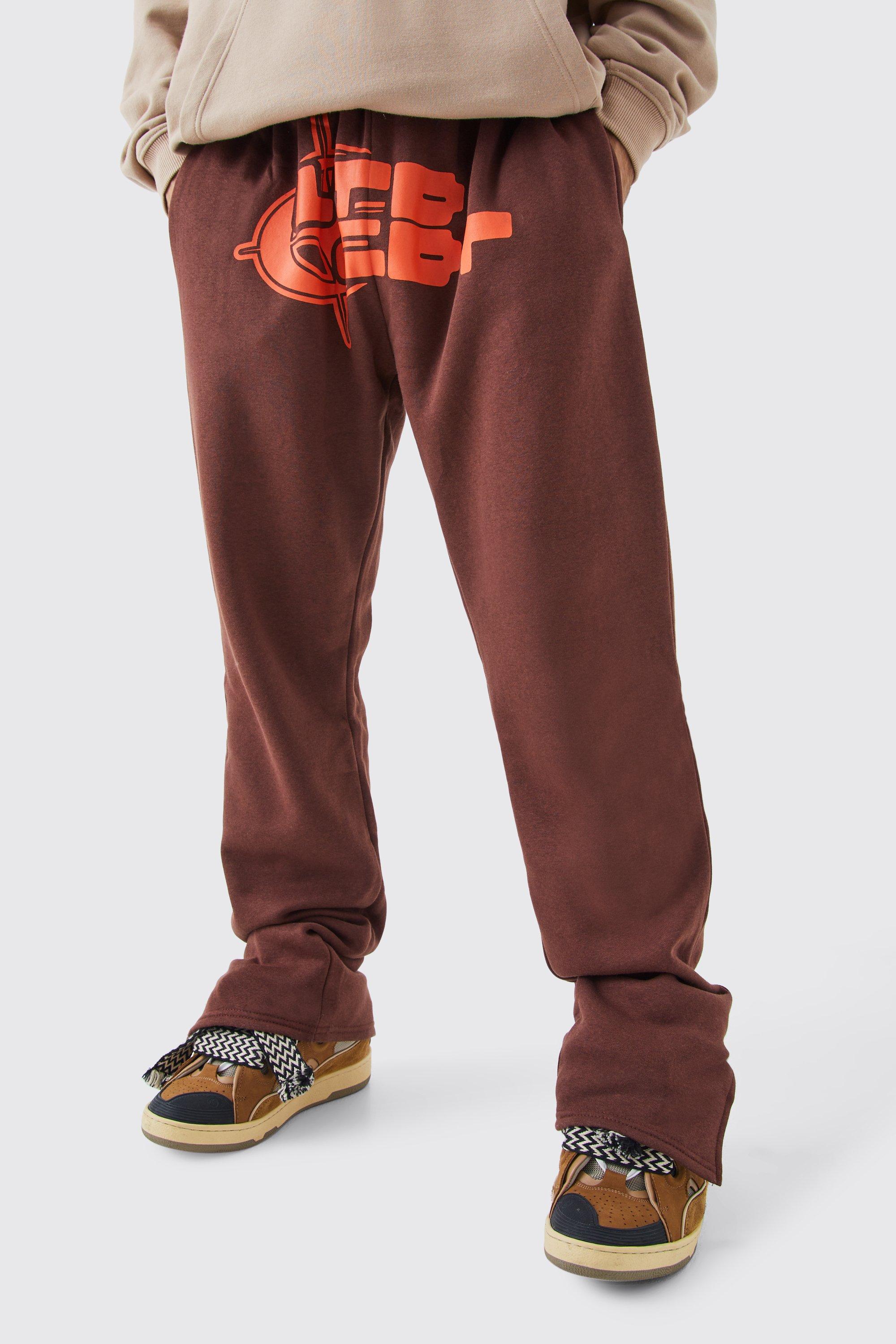 Image of Pantaloni tuta con grafica Target e spacco sul fondo, Brown