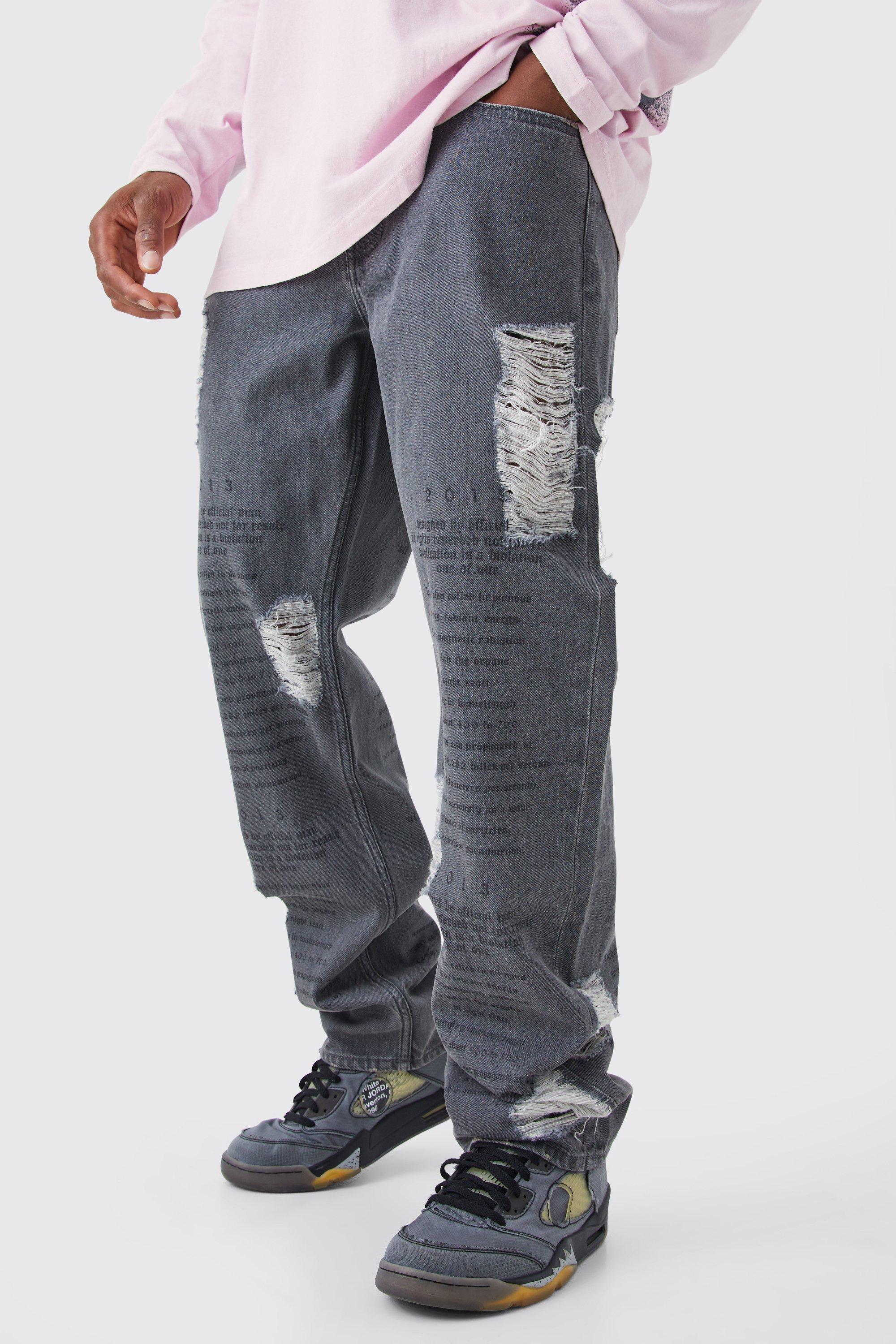 Image of Jeans rilassati in denim rigido effetto smagliato con testo al laser, Grigio