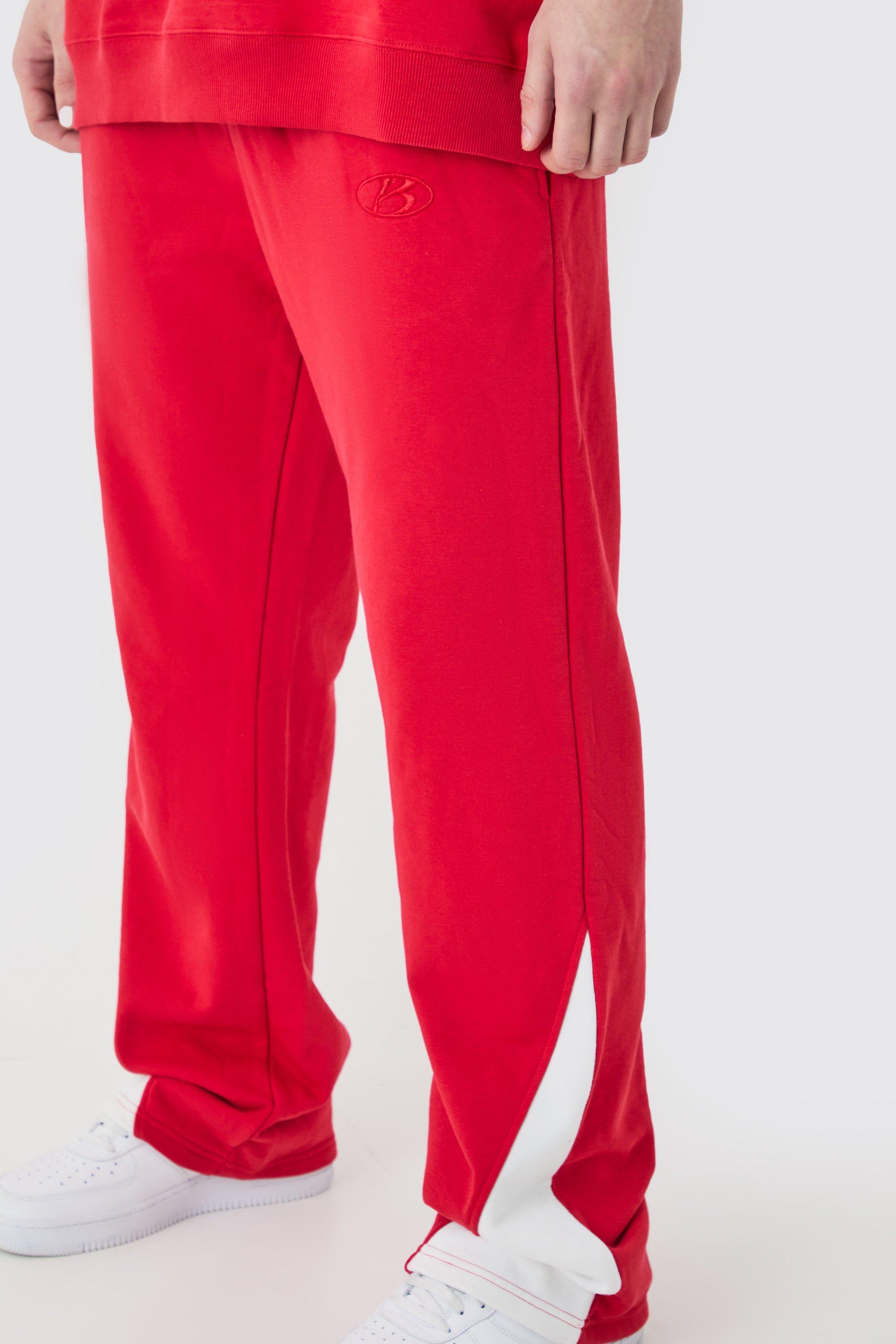 Image of Pantaloni tuta Tall Regular pesanti con inserti grezzi, Rosso