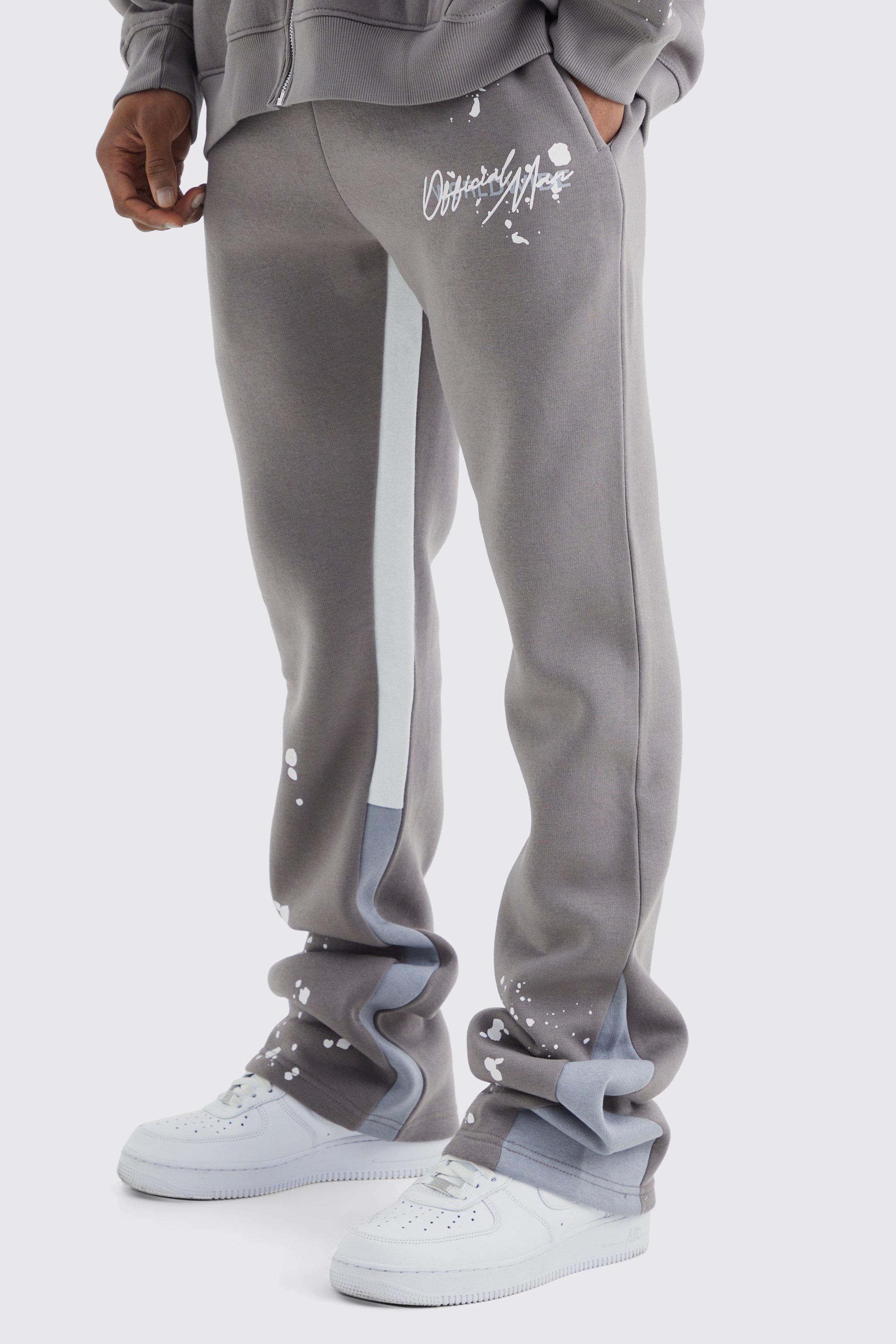 Image of Pantaloni tuta Slim Fit a zampa con pieghe sul fondo e inserti, Grigio