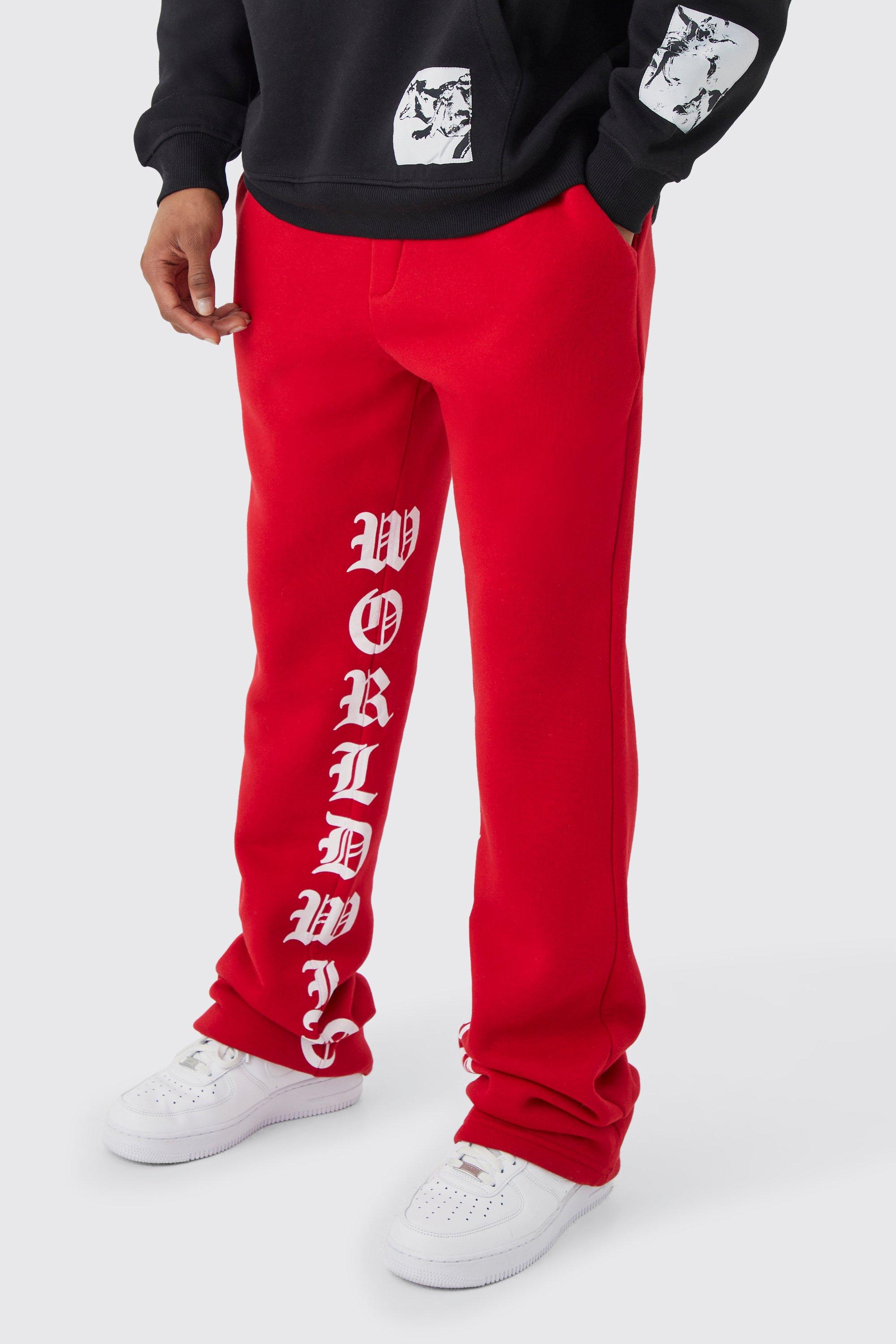 Image of Pantaloni tuta Slim Fit a zampa con stampa e pieghe sul fondo, Rosso
