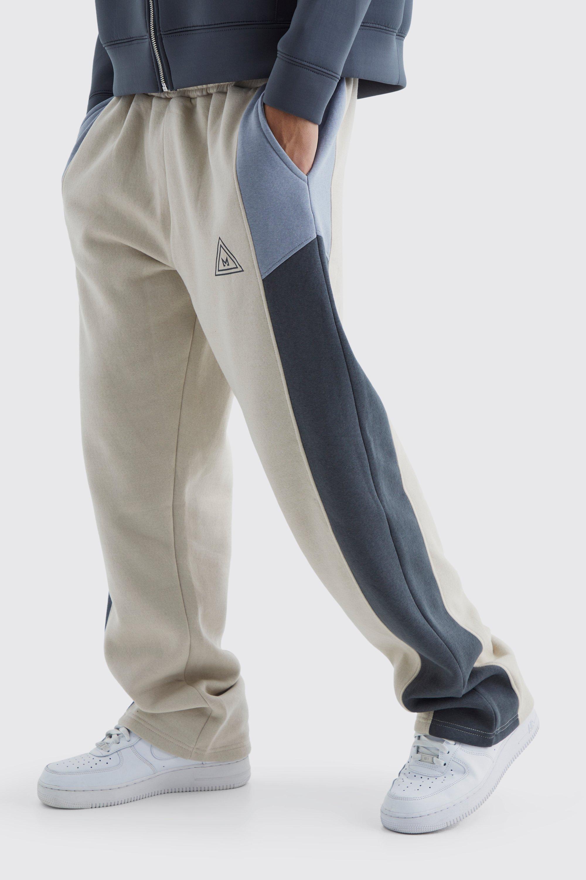 Image of Pantaloni tuta rilassati a blocchi di colore con logo, Grigio