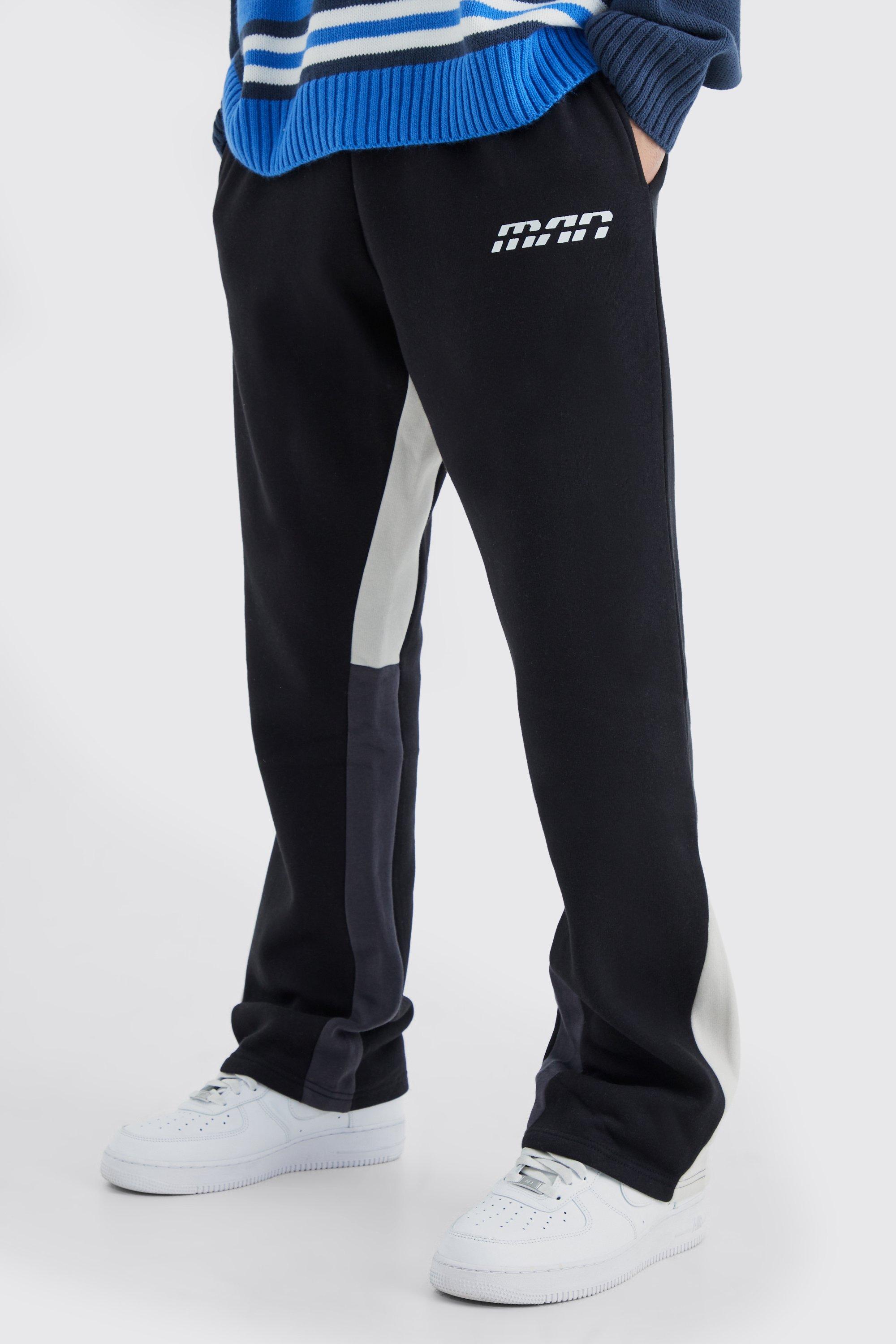 Image of Pantaloni tuta Slim Fit a blocchi di colore con inserti, Nero