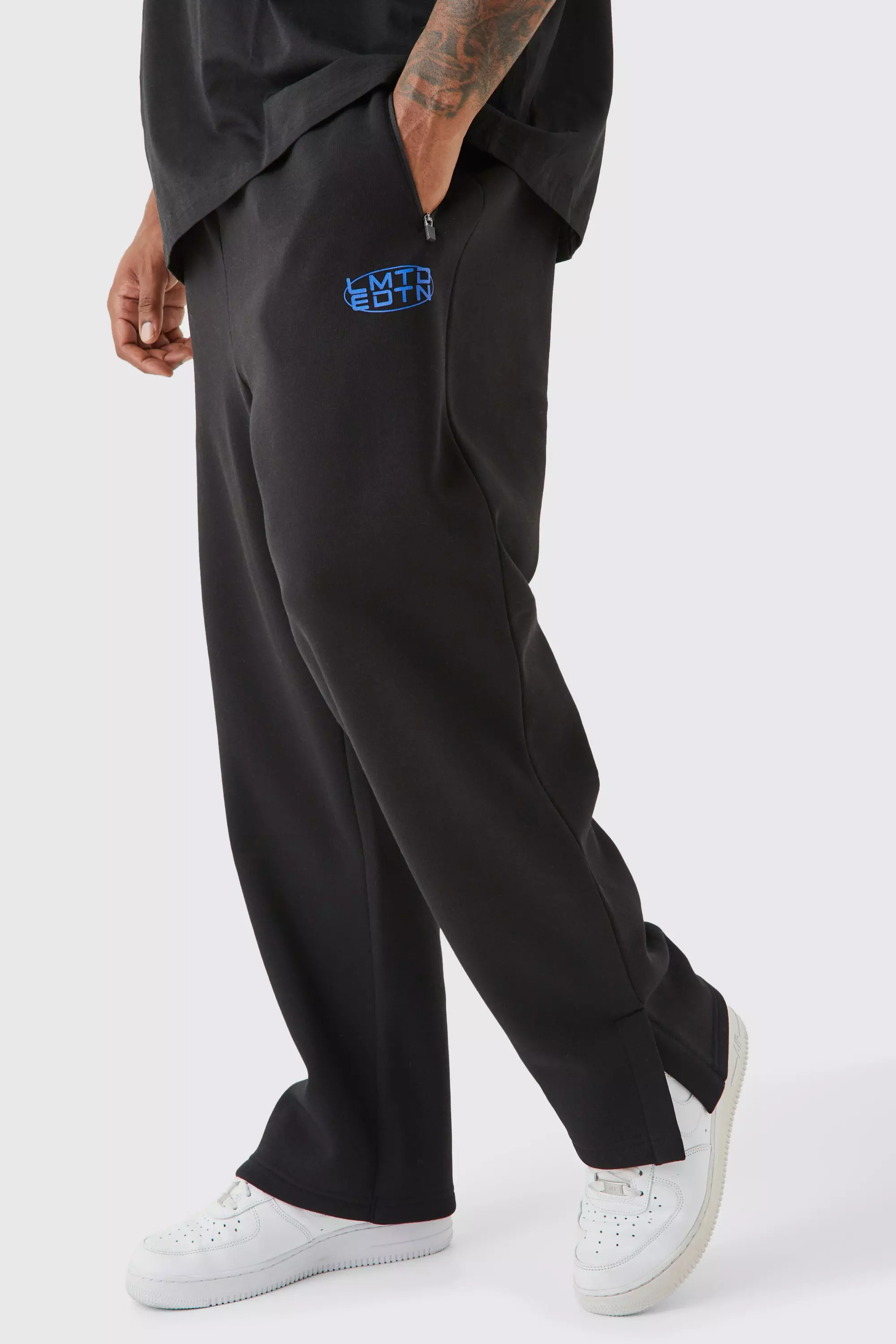 Split black best sale and white sweatpants