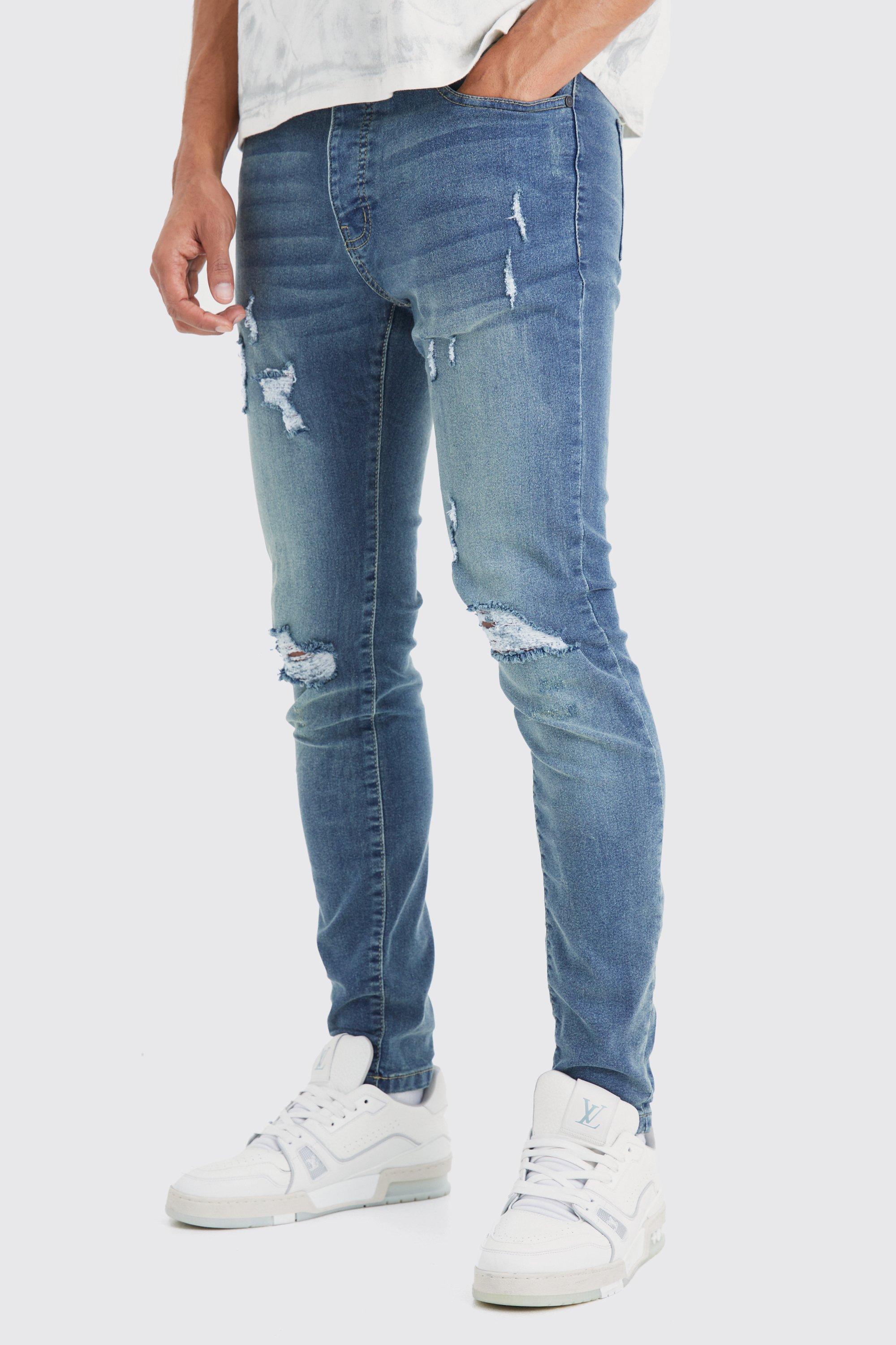 Image of Jeans Skinny Fit Stretch con strappi estremi sul ginocchio, Azzurro
