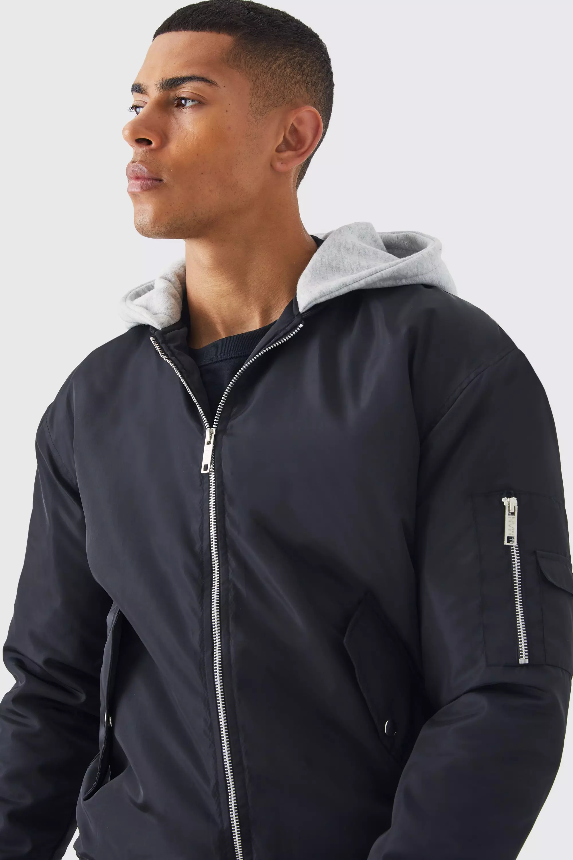 Black bomber jacket with grey outlet hood