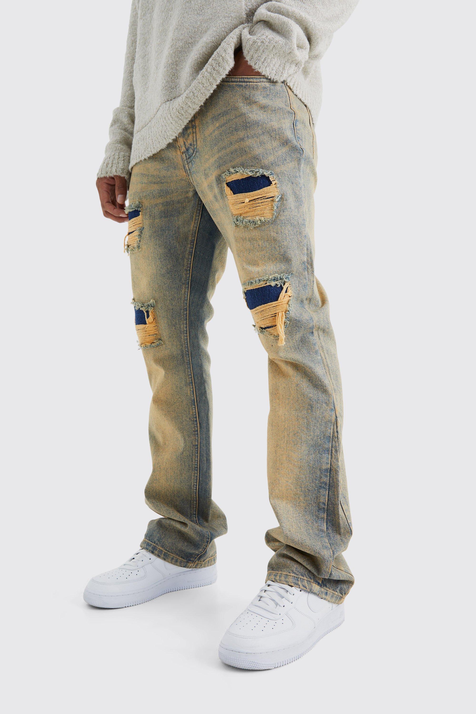 Image of Jeans a zampa Slim Fit in denim rigido con strappi & rattoppi, Grigio