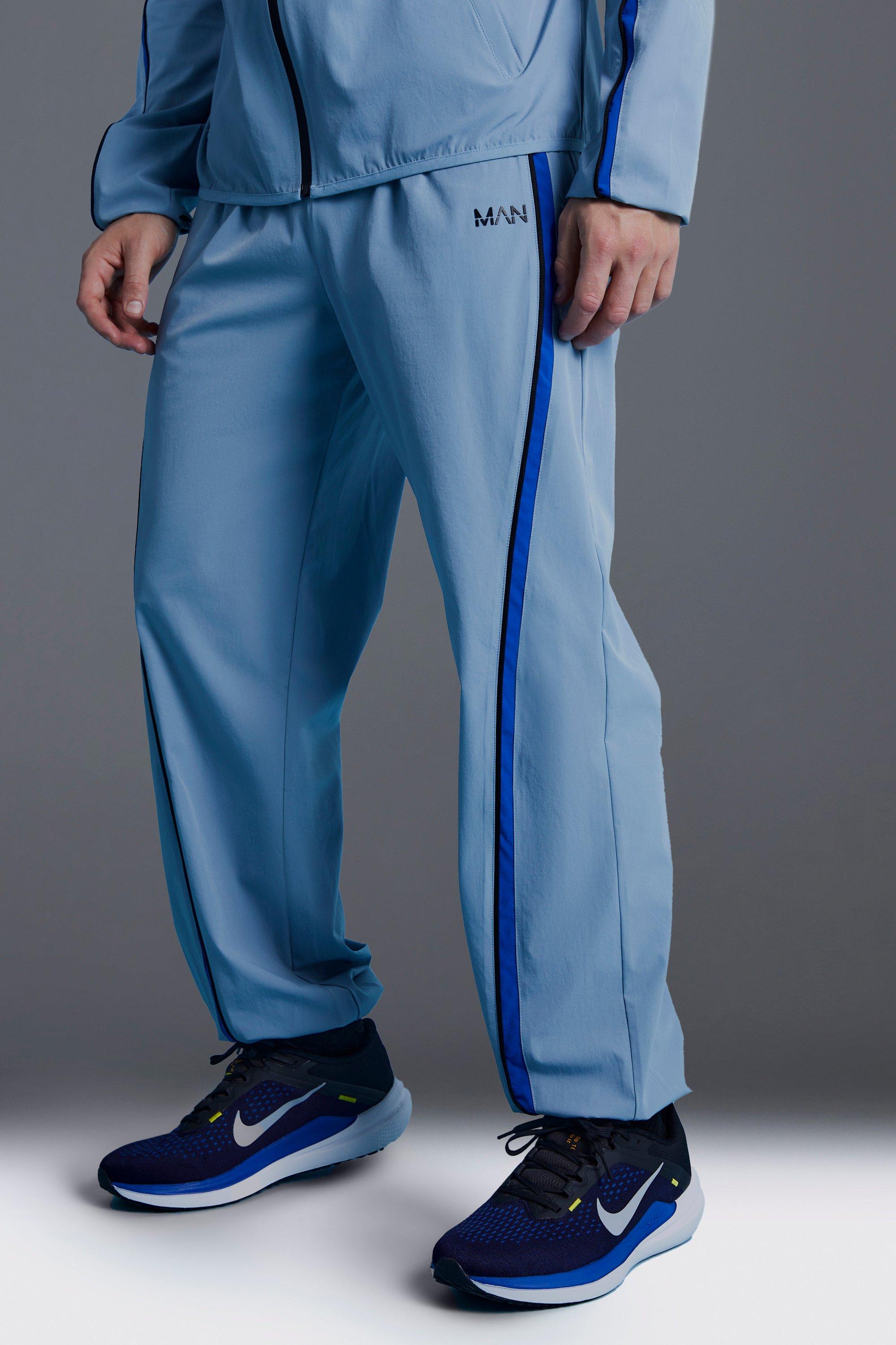 Image of Pantaloni tuta Man Active a blocchi di colore, Azzurro