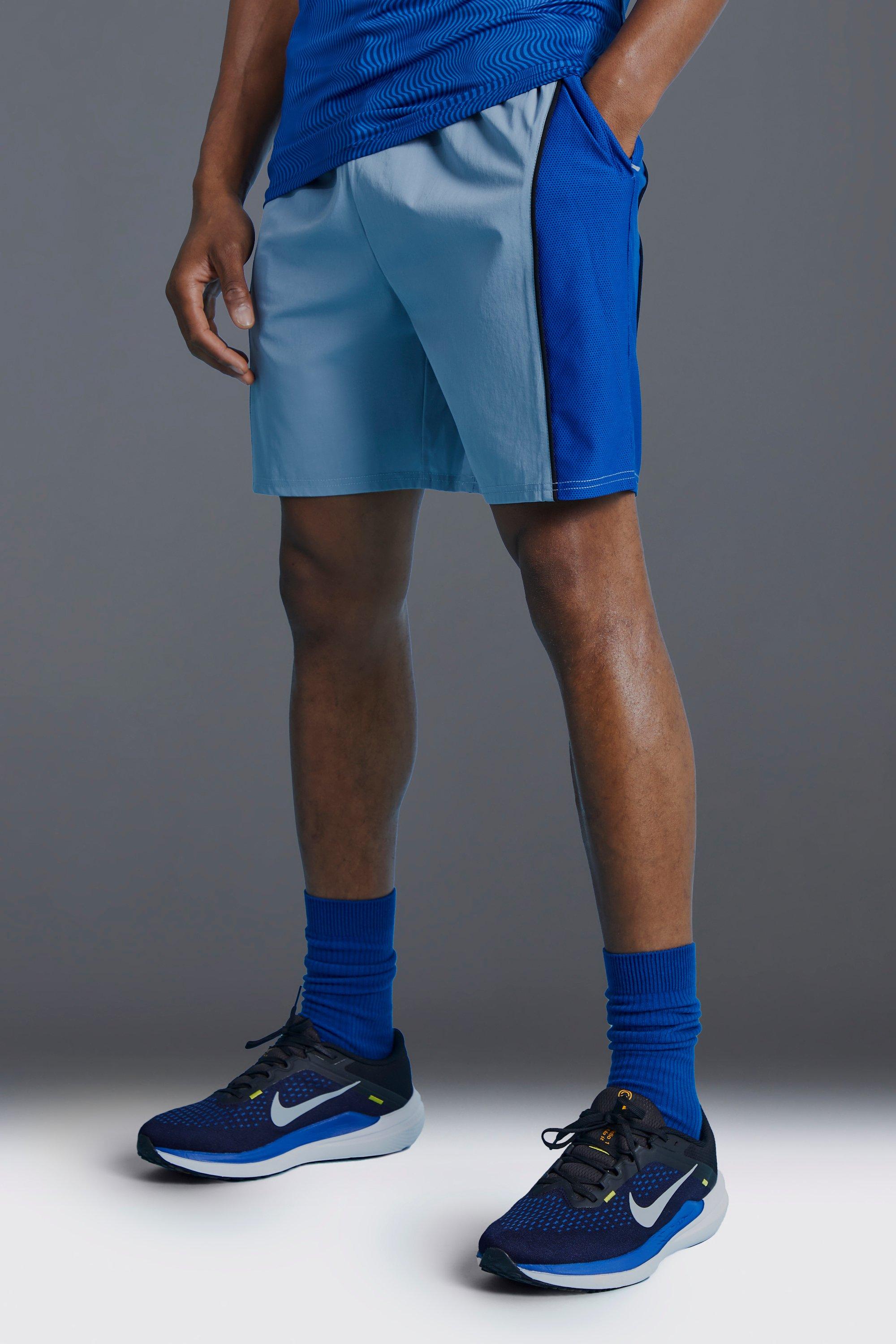 Image of Pantaloncini Man Active a blocchi di colore con pannelli, Azzurro