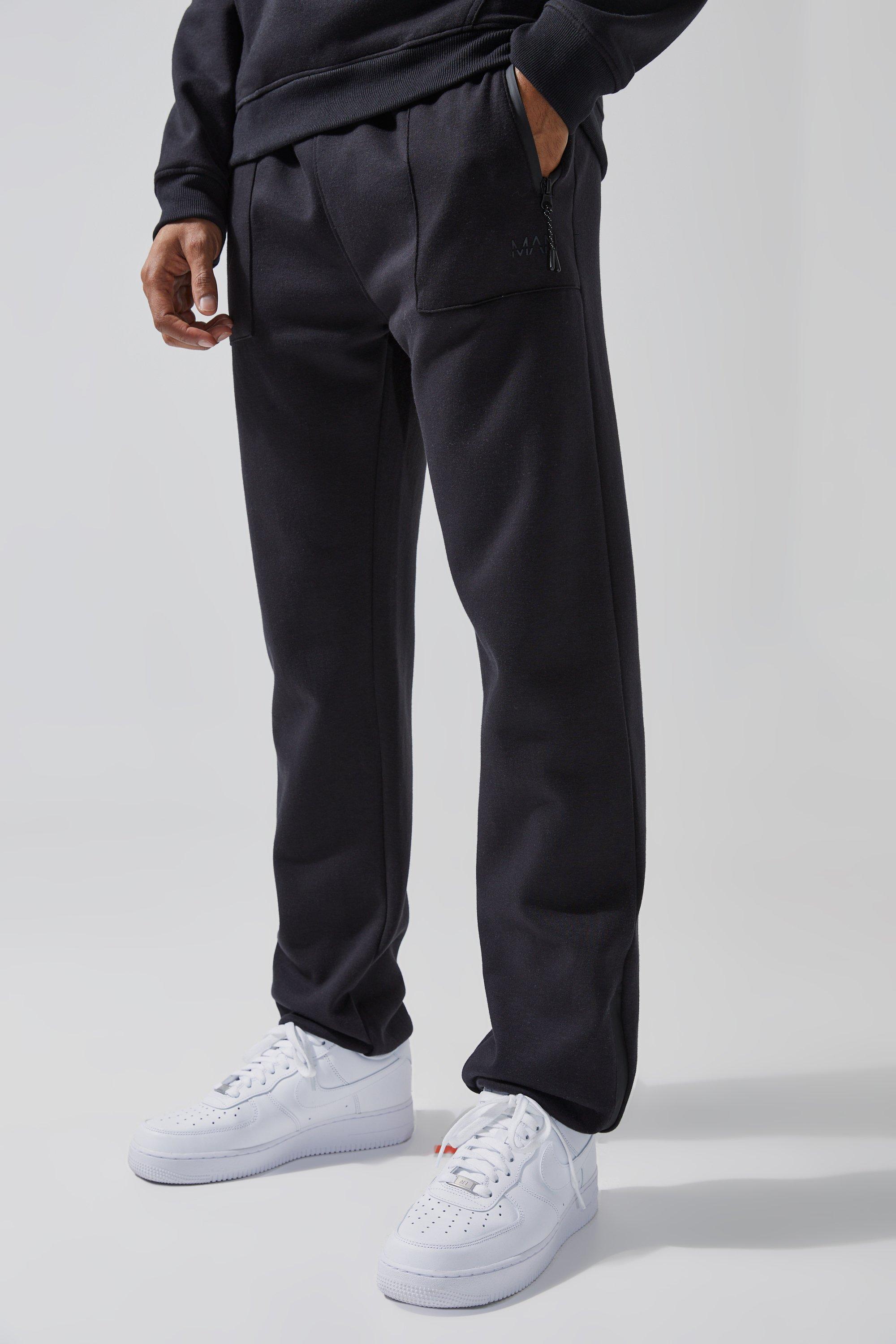 Image of Pantaloni tuta Man Active Tech con zip sul fondo, Nero