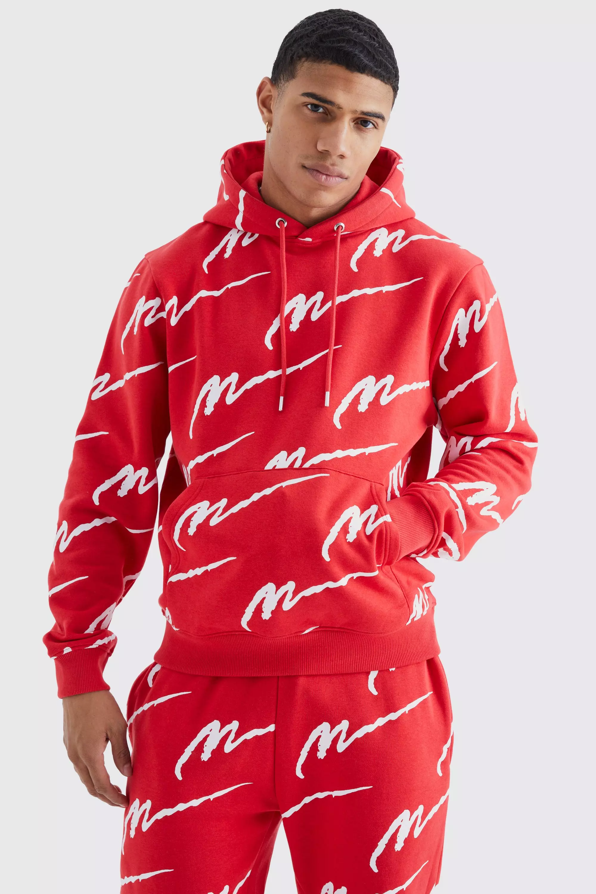 All over man best sale printed hooded tracksuit red